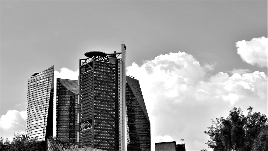 Black and white view of the BBVA and Torre Reforma towers on Paseo de la Reforma in Mexico City, illustrating the Mexico markets report