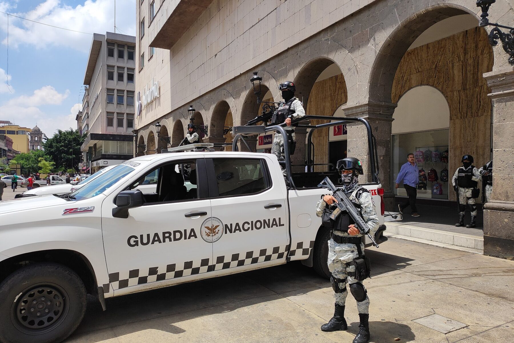 Mexican soldiers on patrol, reflecting the cut in public-security troops
