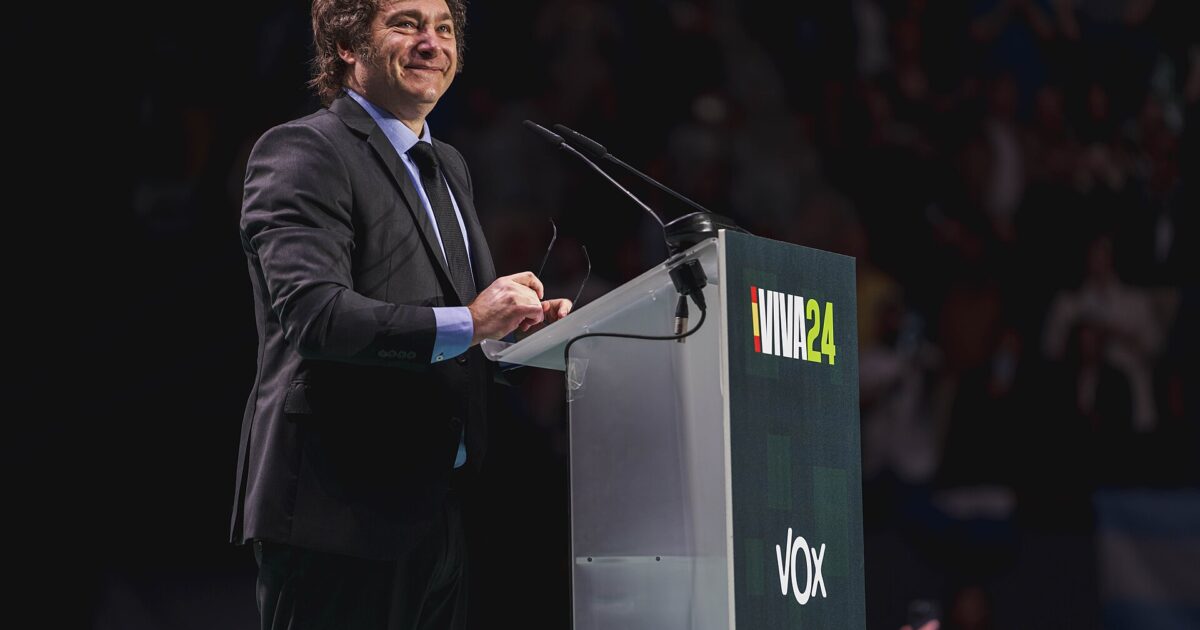 Javier Milei speaking at a podium with Argentine flag, illustrating Milei youth support decline.