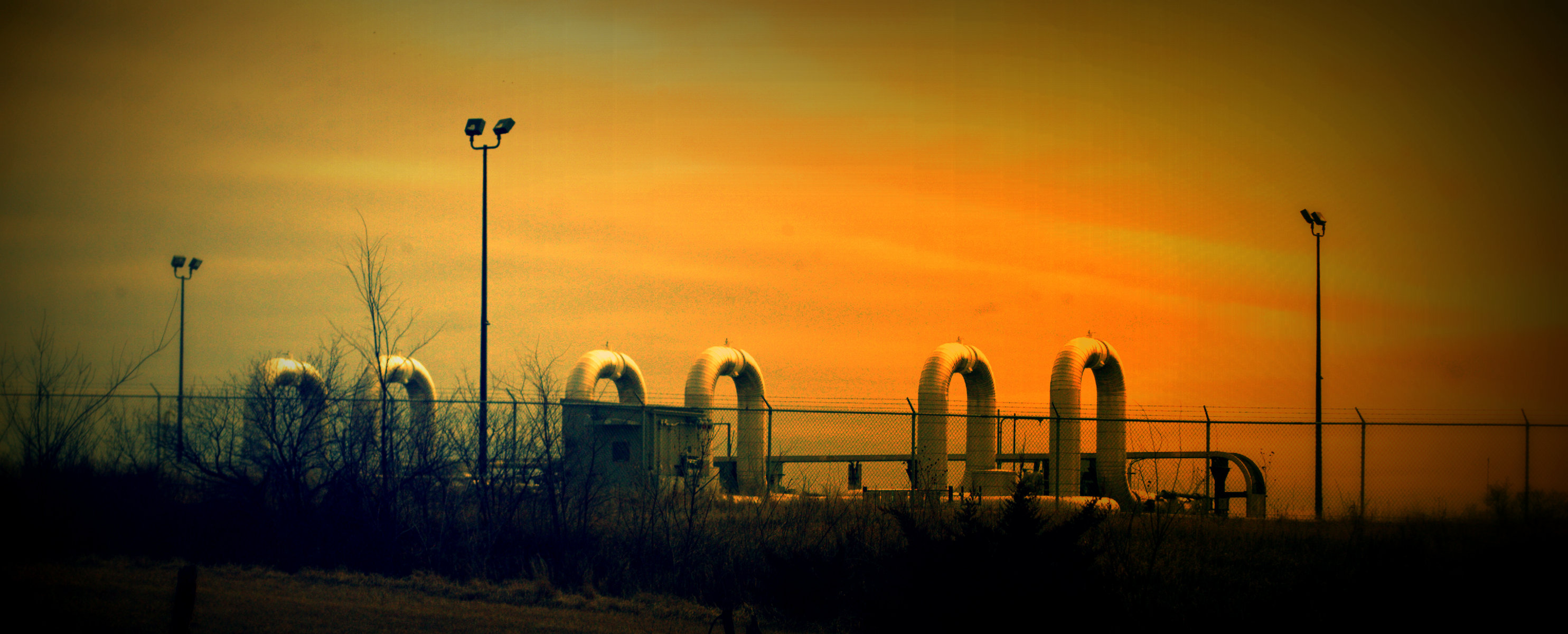 Oil refinery infrastructure, illustrating the USA and Canada Intelligence Brief for August 11, 2026