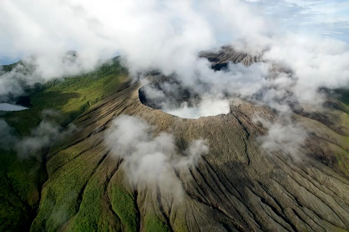 The crater lake at the summit, source of the Rincón de la Vieja eruptions