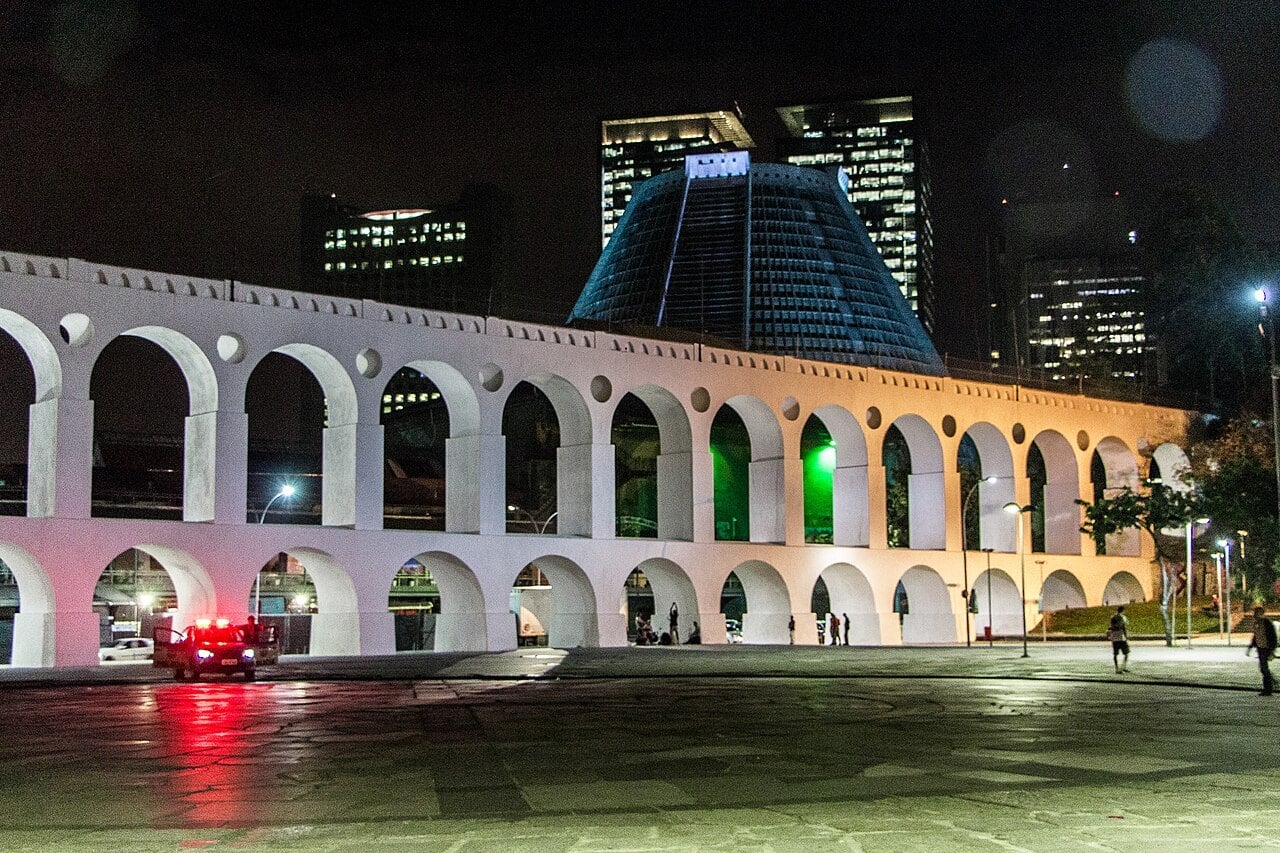 The Arcos da Lapa lit at night, the centre of Rio de Janeiro nightlife on a Friday