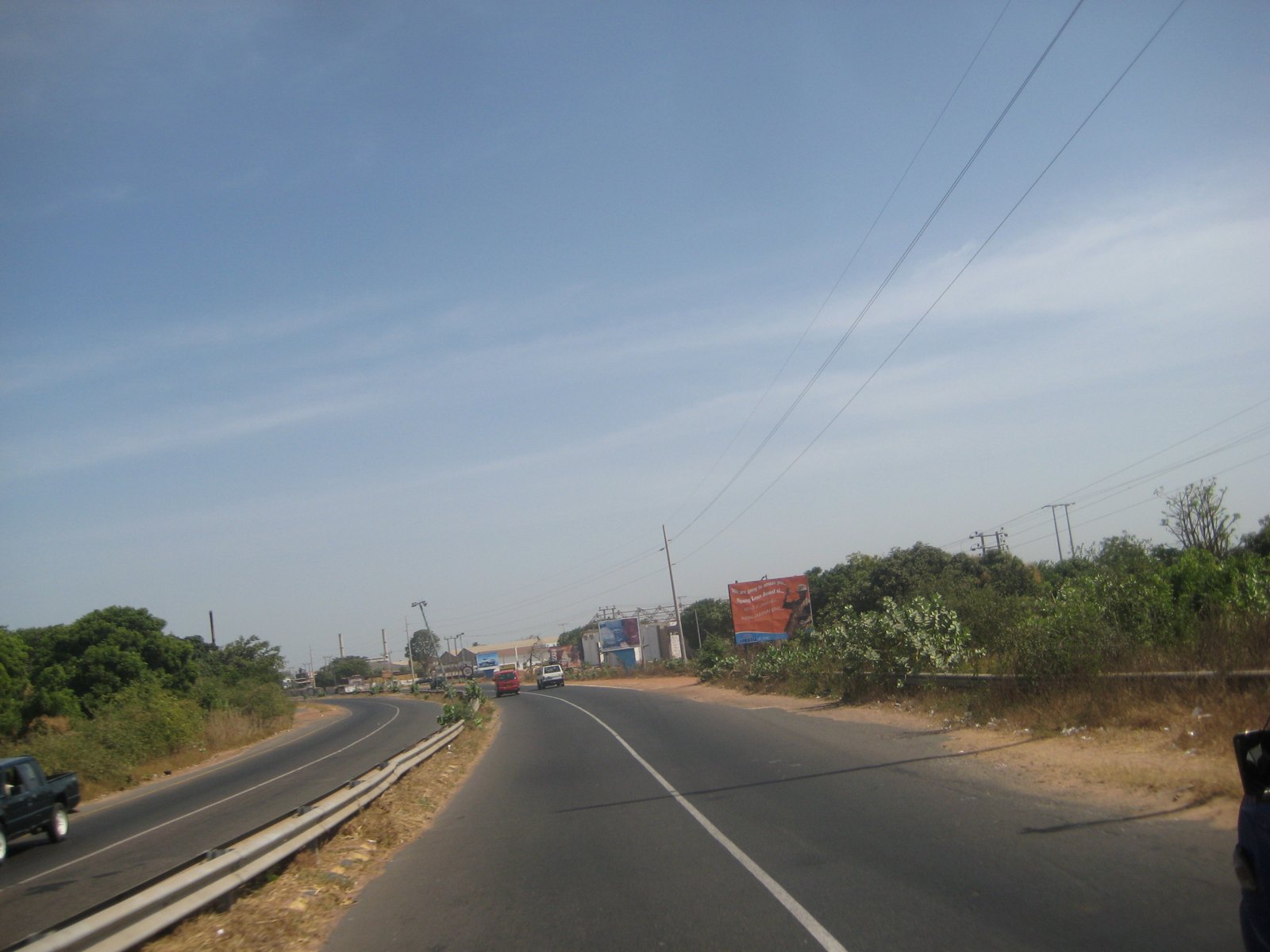 A road in The Gambia, illustrating the Gambia road project