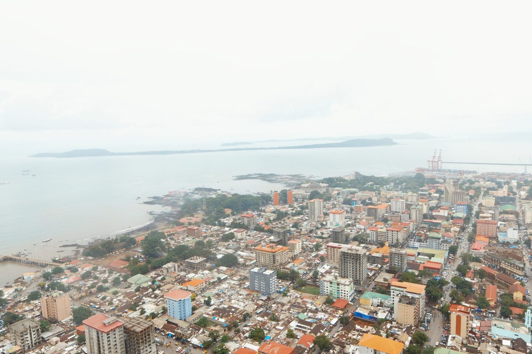 Conakry seen from above, the city where the Dar-es-Salam landfill collapse happened