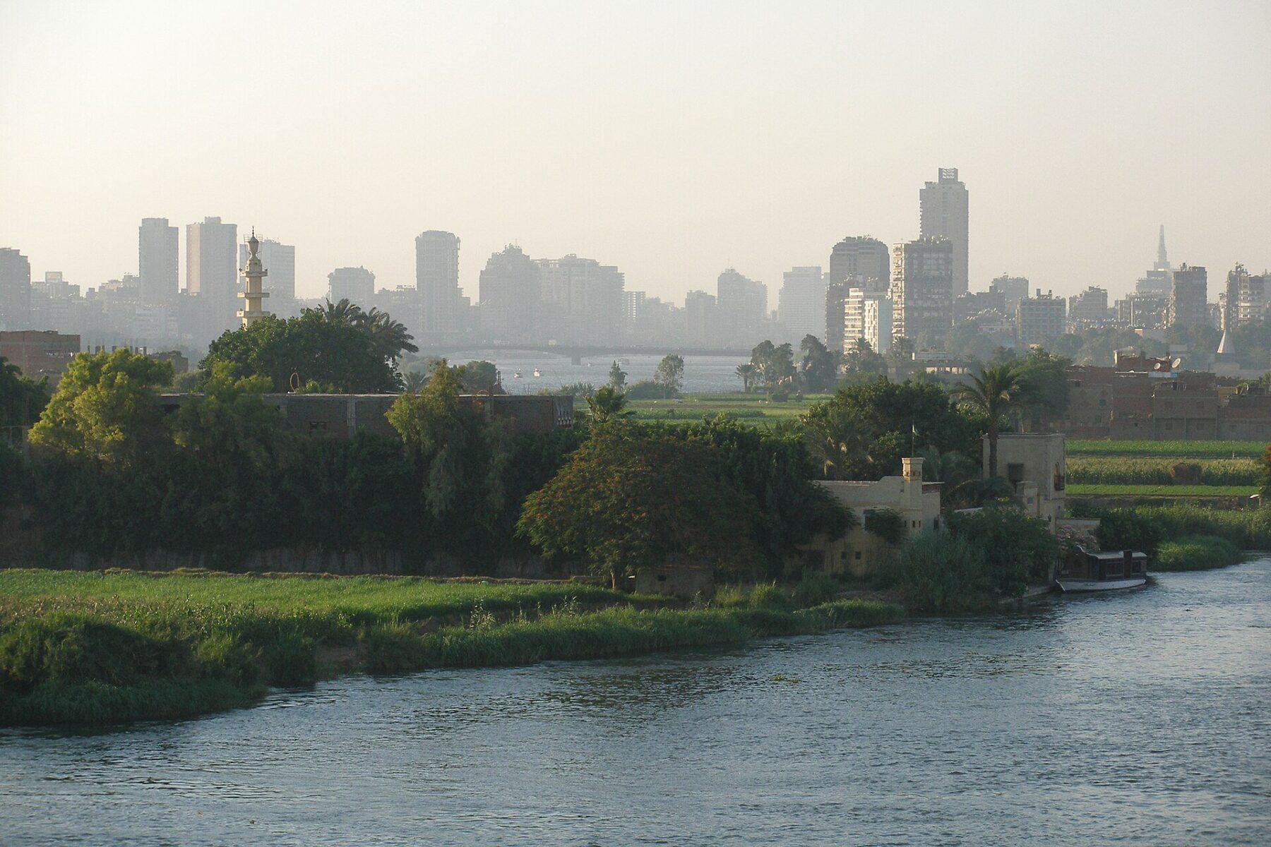 Nile River, Cairo skyline, green banks, minaret