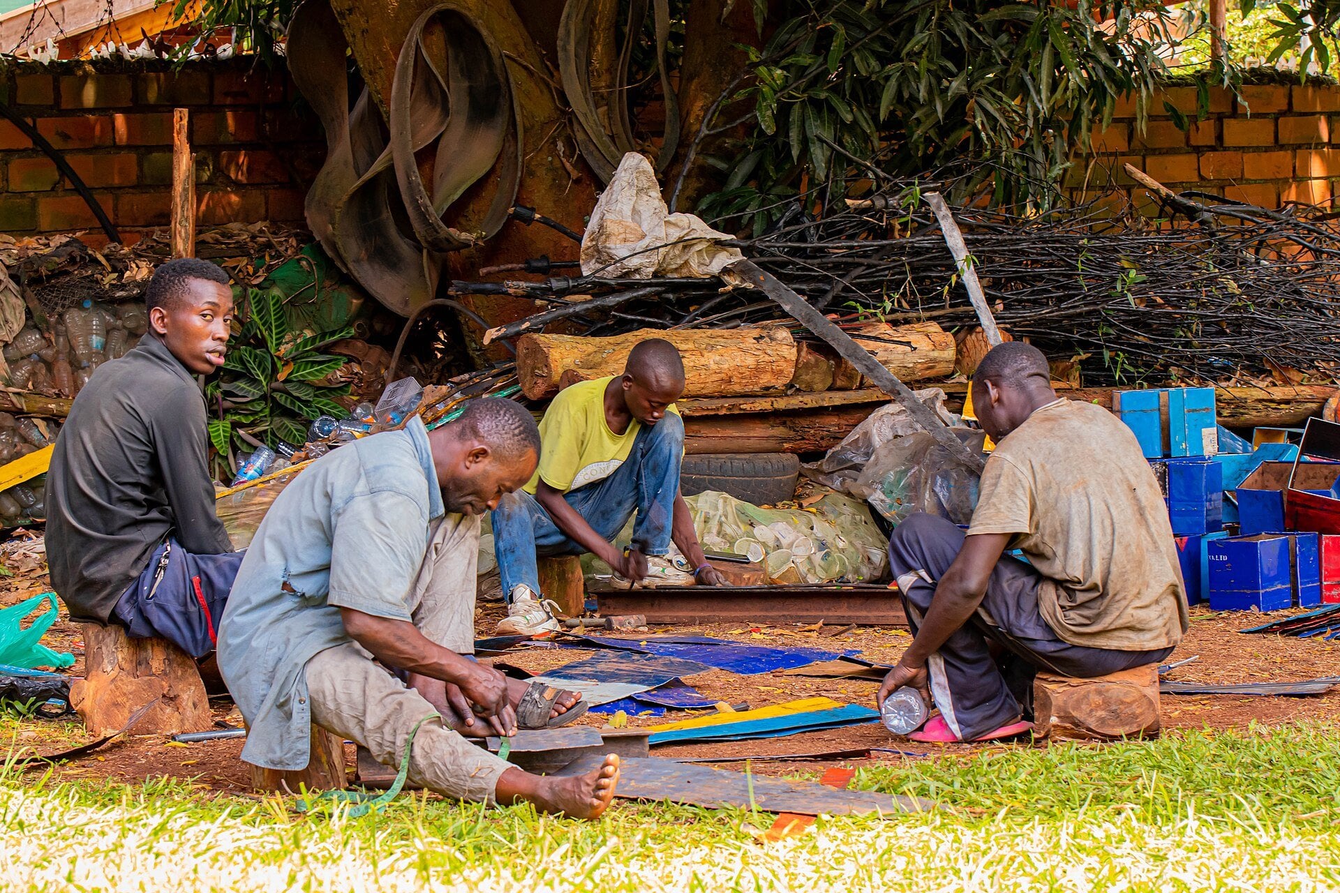 Kenya charcoal prices - artisans making charcoal cooking stoves in Kenya