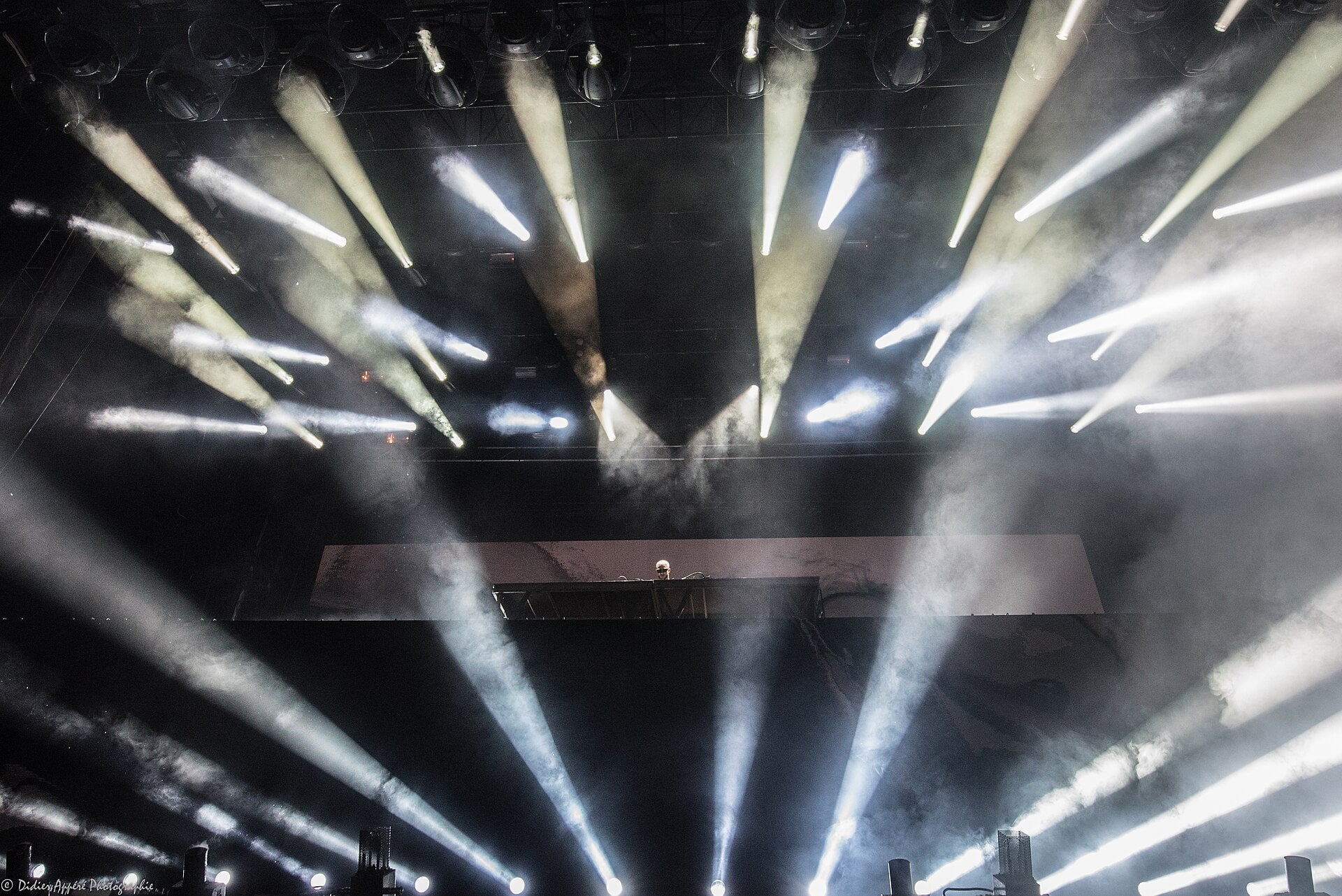 DJ Snake - the French DJ performing onstage under bright lights