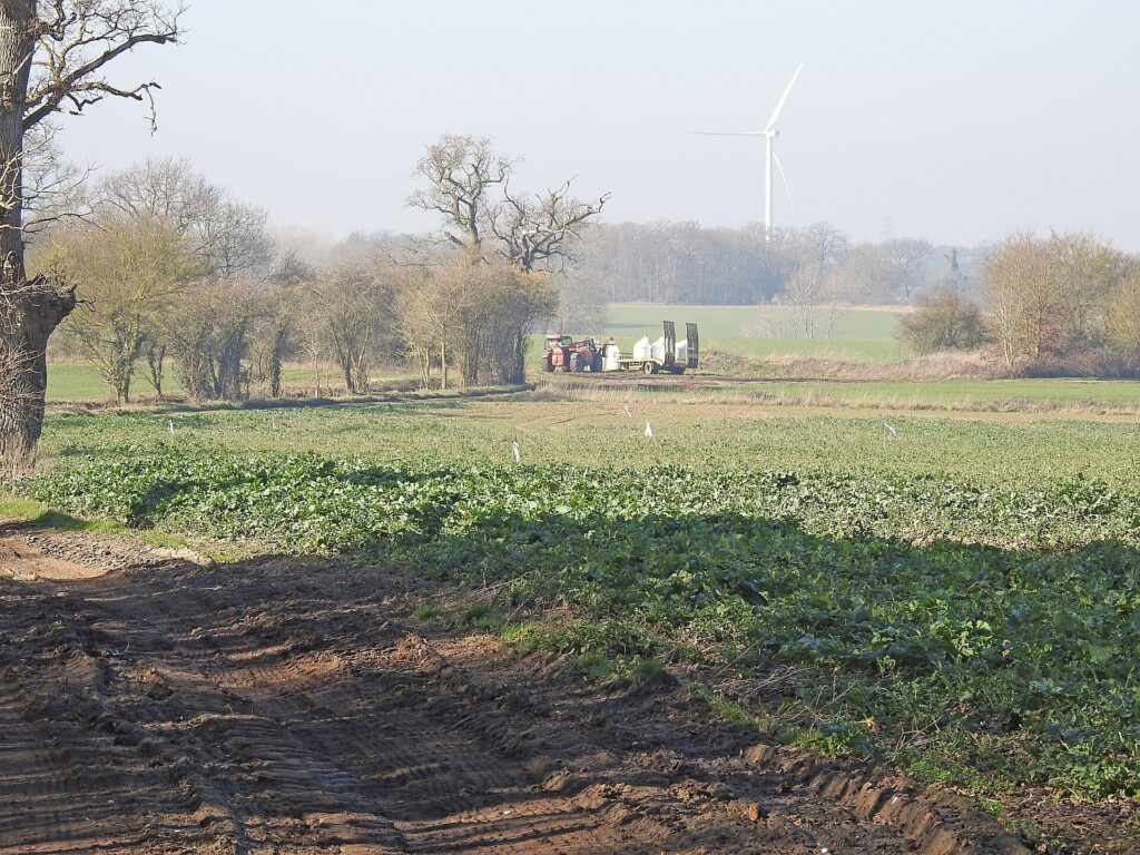 Tractor with fertilizer bags in a field