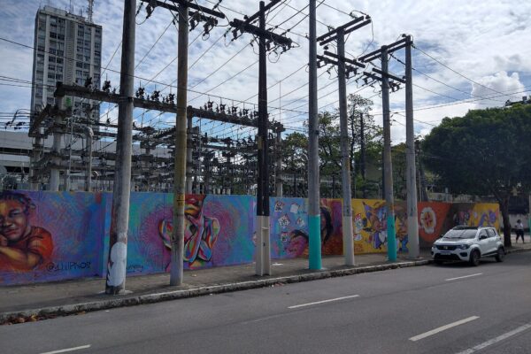 Viva Perifa - colorful graffiti street mural on an urban wall in Brazil