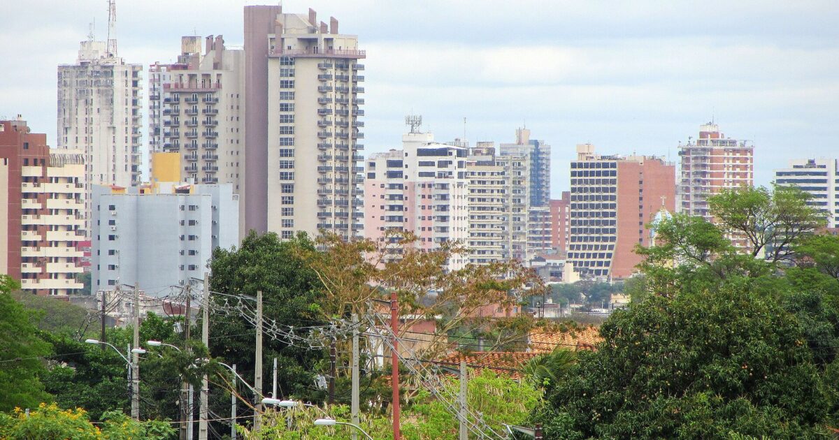 Asuncion skyline of apartment and office towers in Paraguay, the low-cost hub whose Paraguay residency solvency rules changed in July 2026