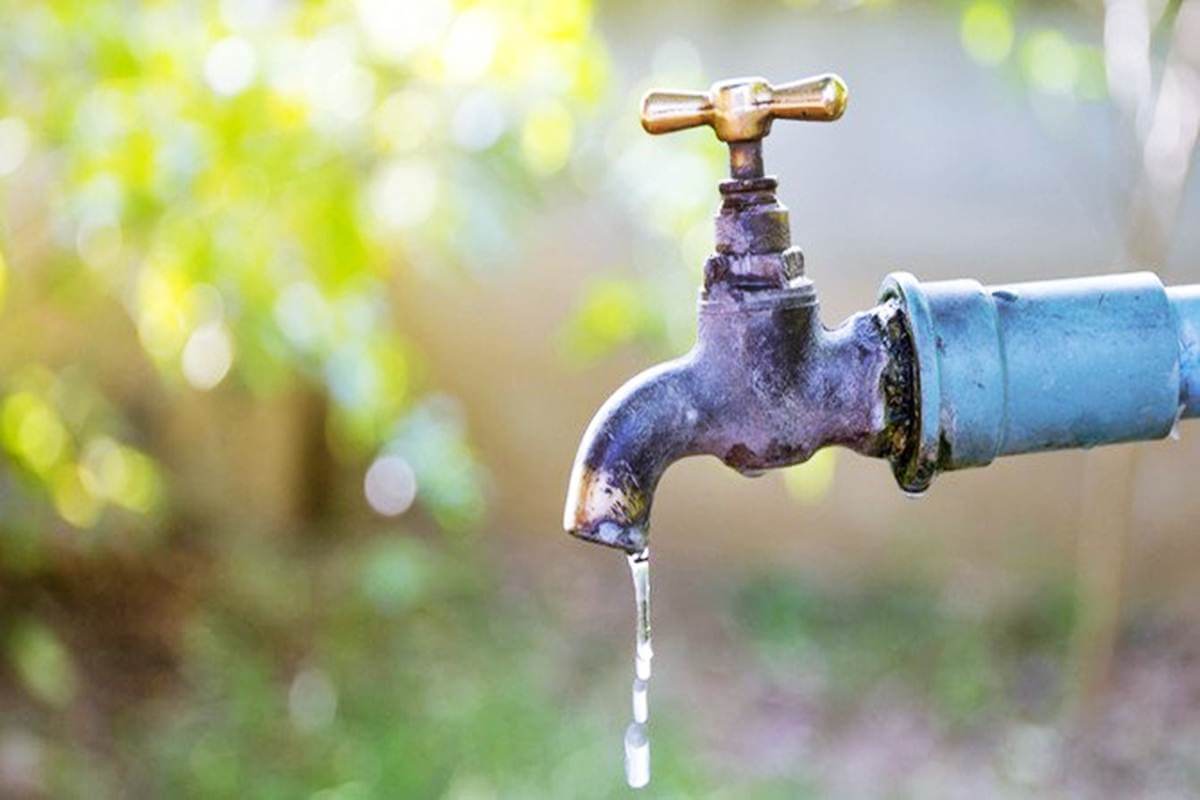 Jamaica rural water - an outdoor tap running slowly