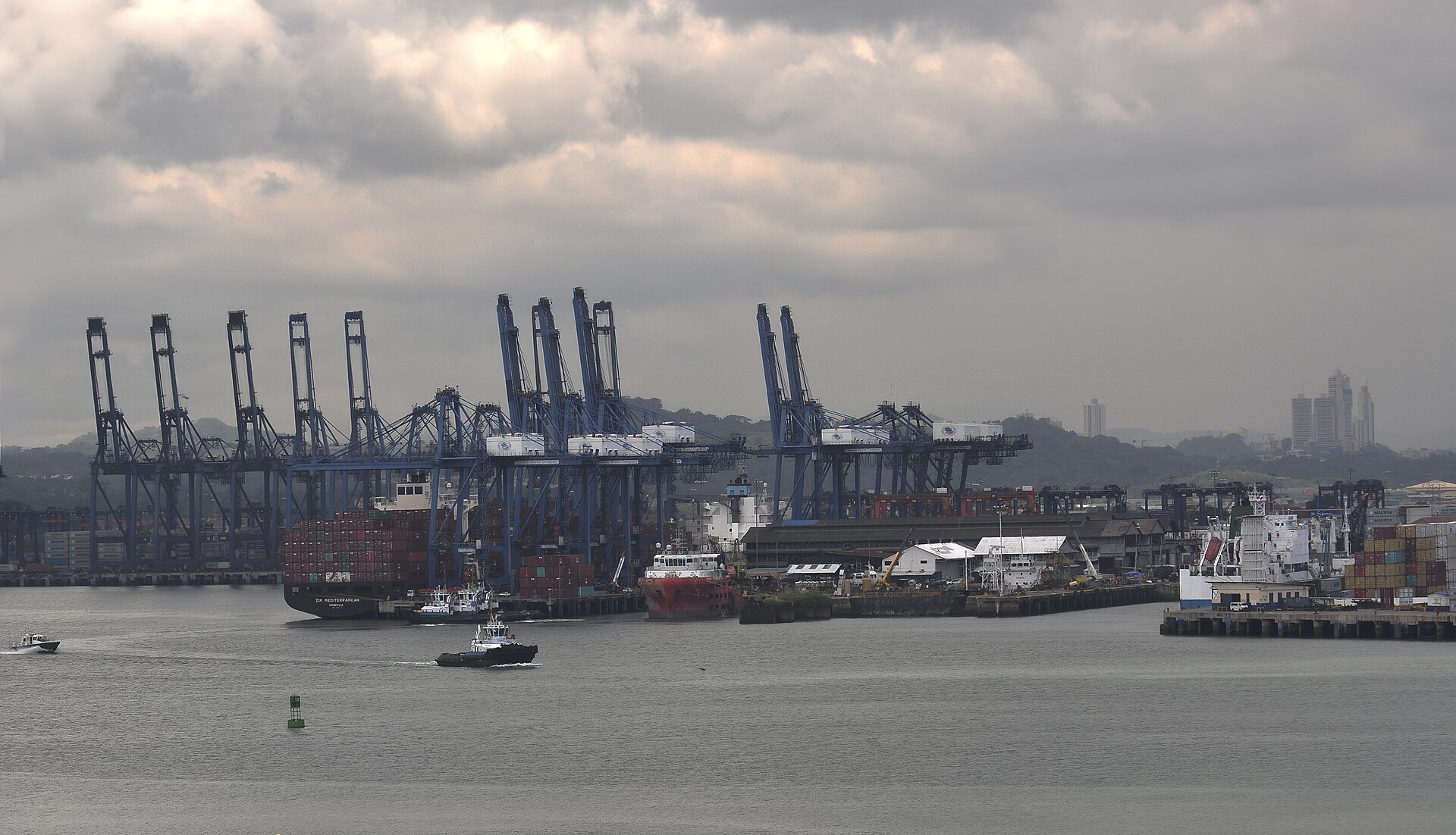 CK Hutchison - container cranes and cargo ships at the Port of Balboa in Panama