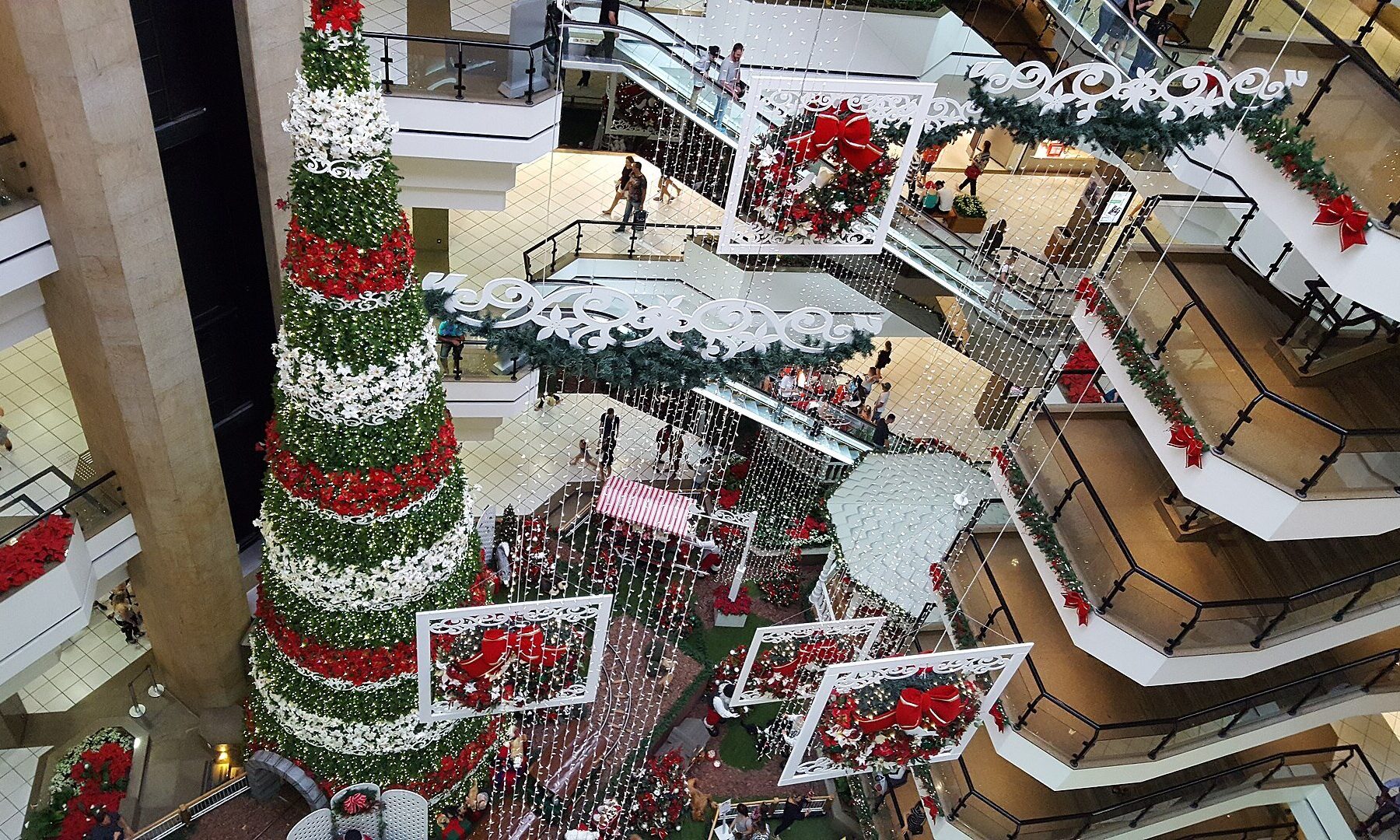 Marisa - shoppers inside a busy shopping mall walkway