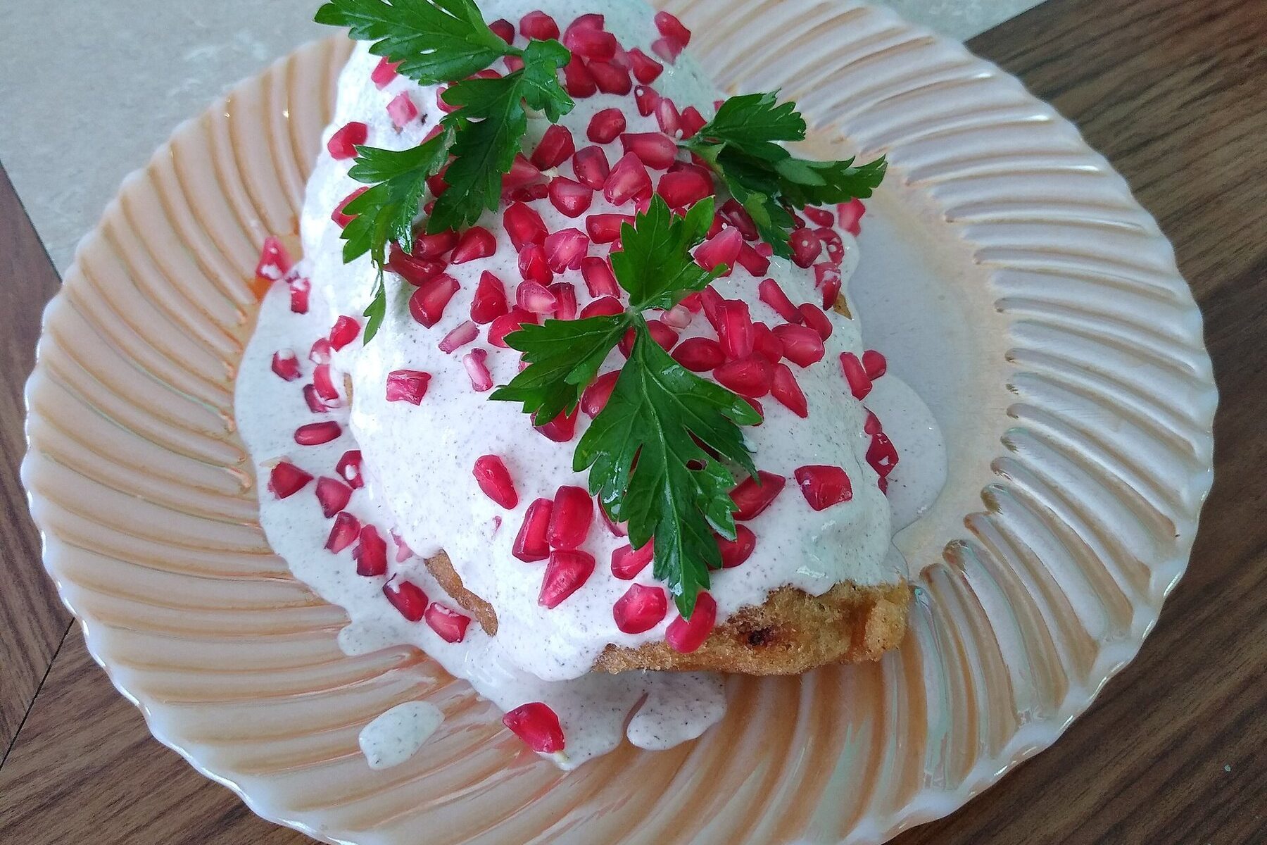 A plated chile en nogada, the dish behind the chiles en nogada season