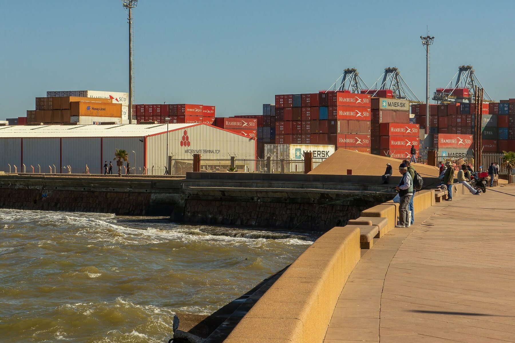 Port of Montevideo container terminal with cranes and stacked shipping containers