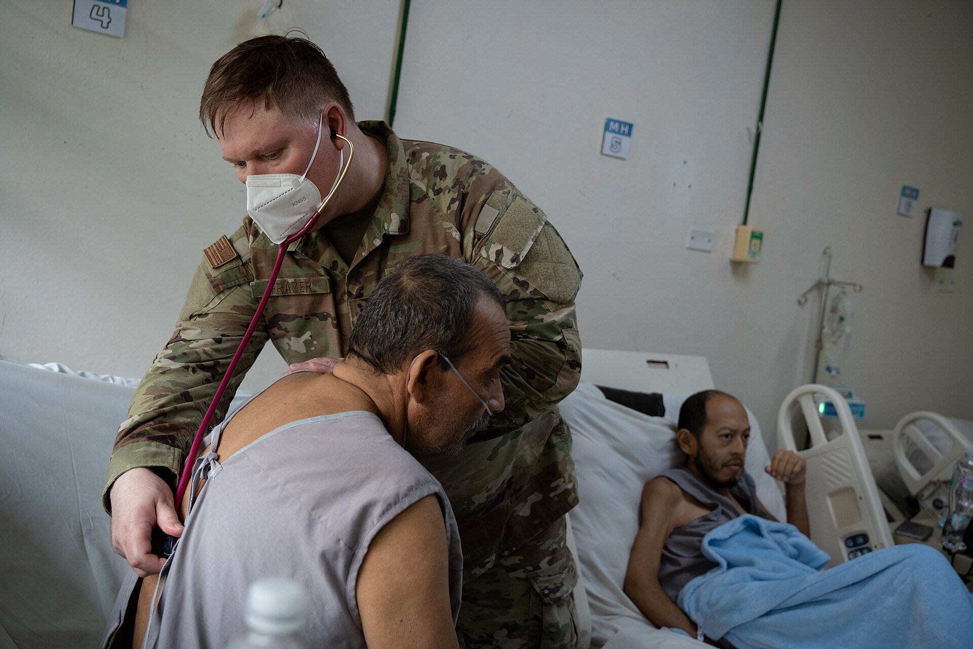 El Salvador hospital - medical staff treating patients in a public hospital ward in El Salvador