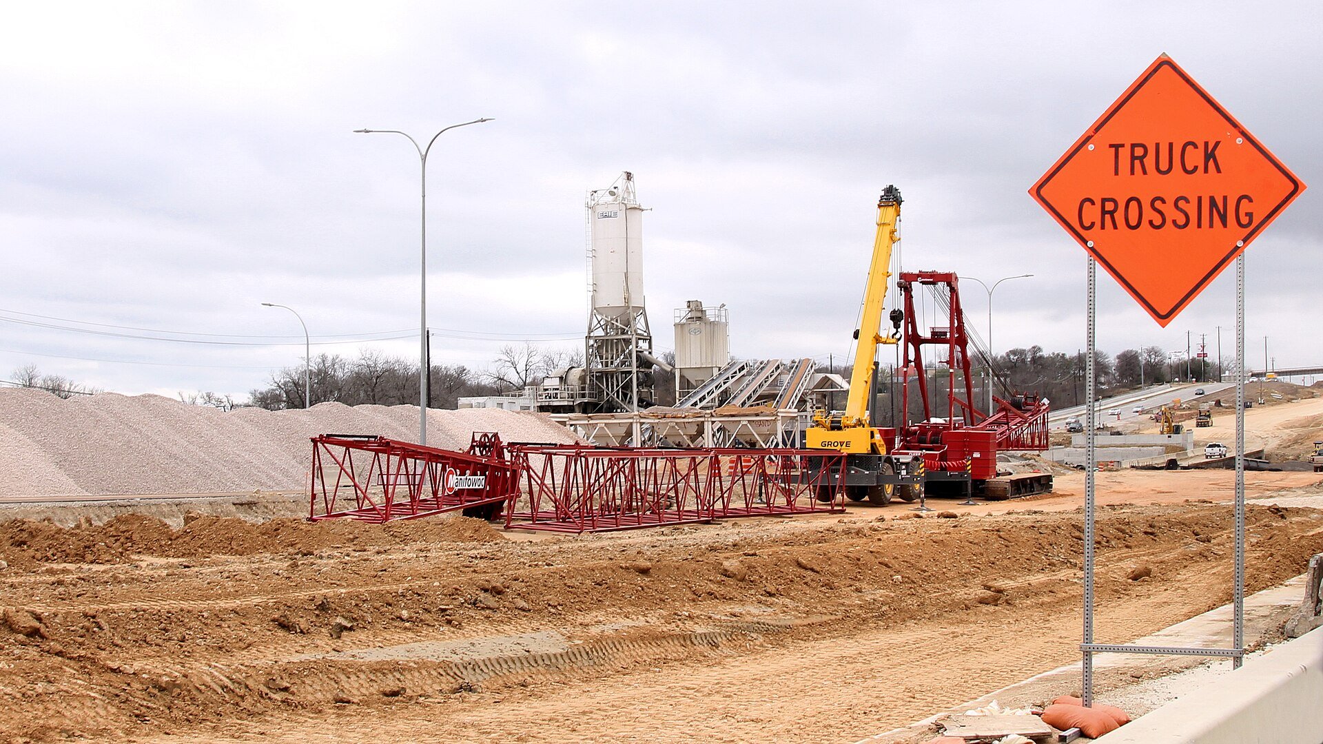 Cemex building-materials context - a cement and concrete production plant with storage silos