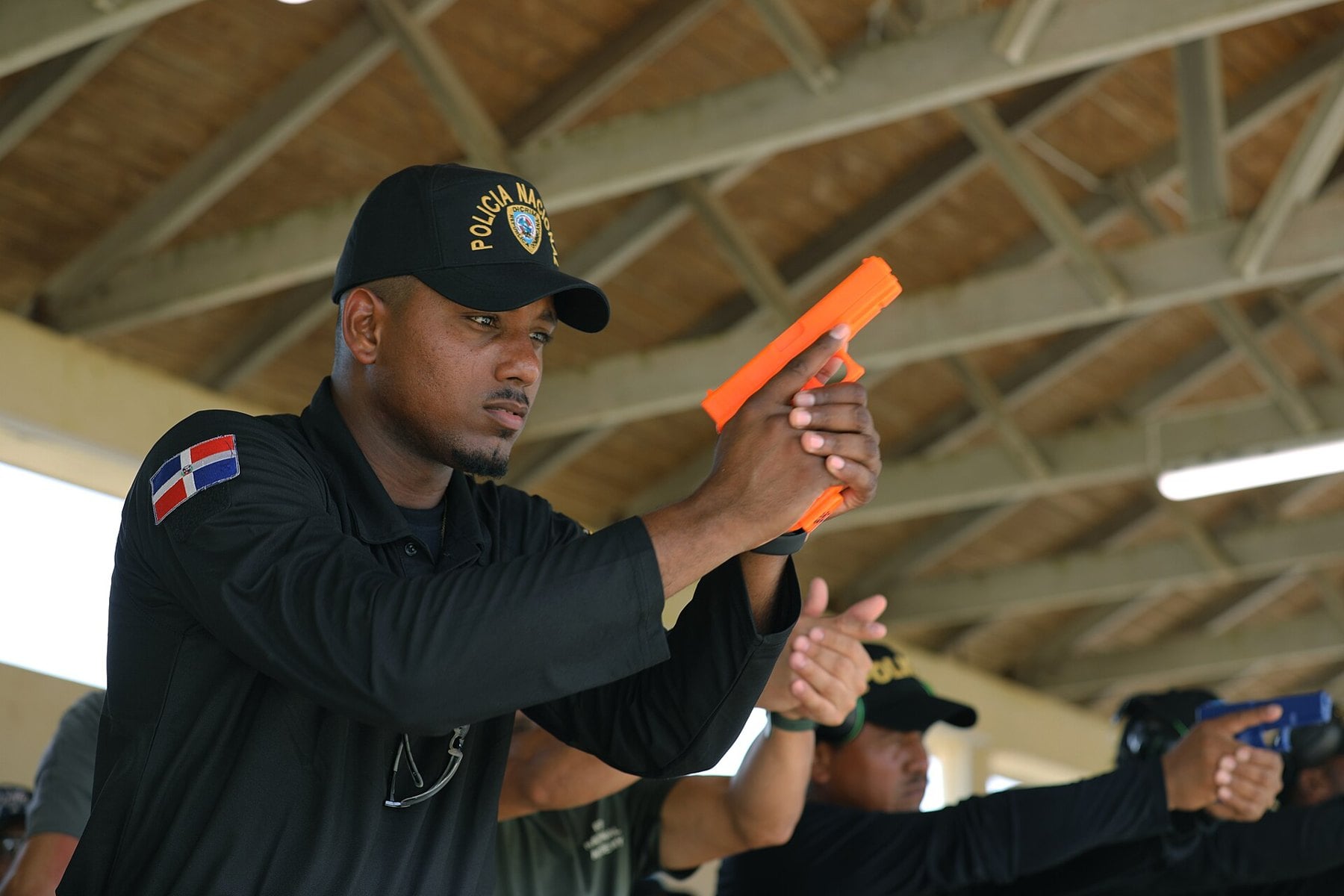 Dominican Police Training - an officer of the Policia Nacional at a firearms course