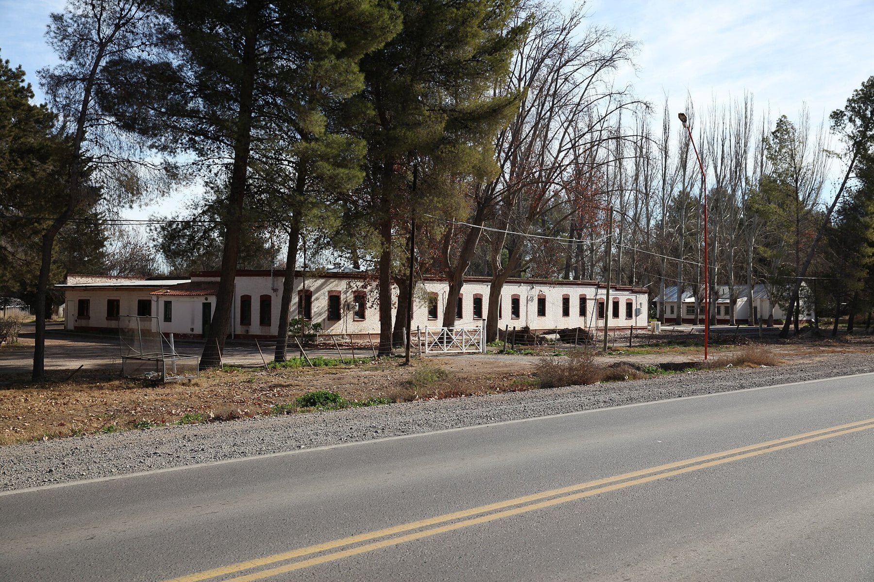 A road and old railway station in General Roca, part of the Río Negro highway transfer