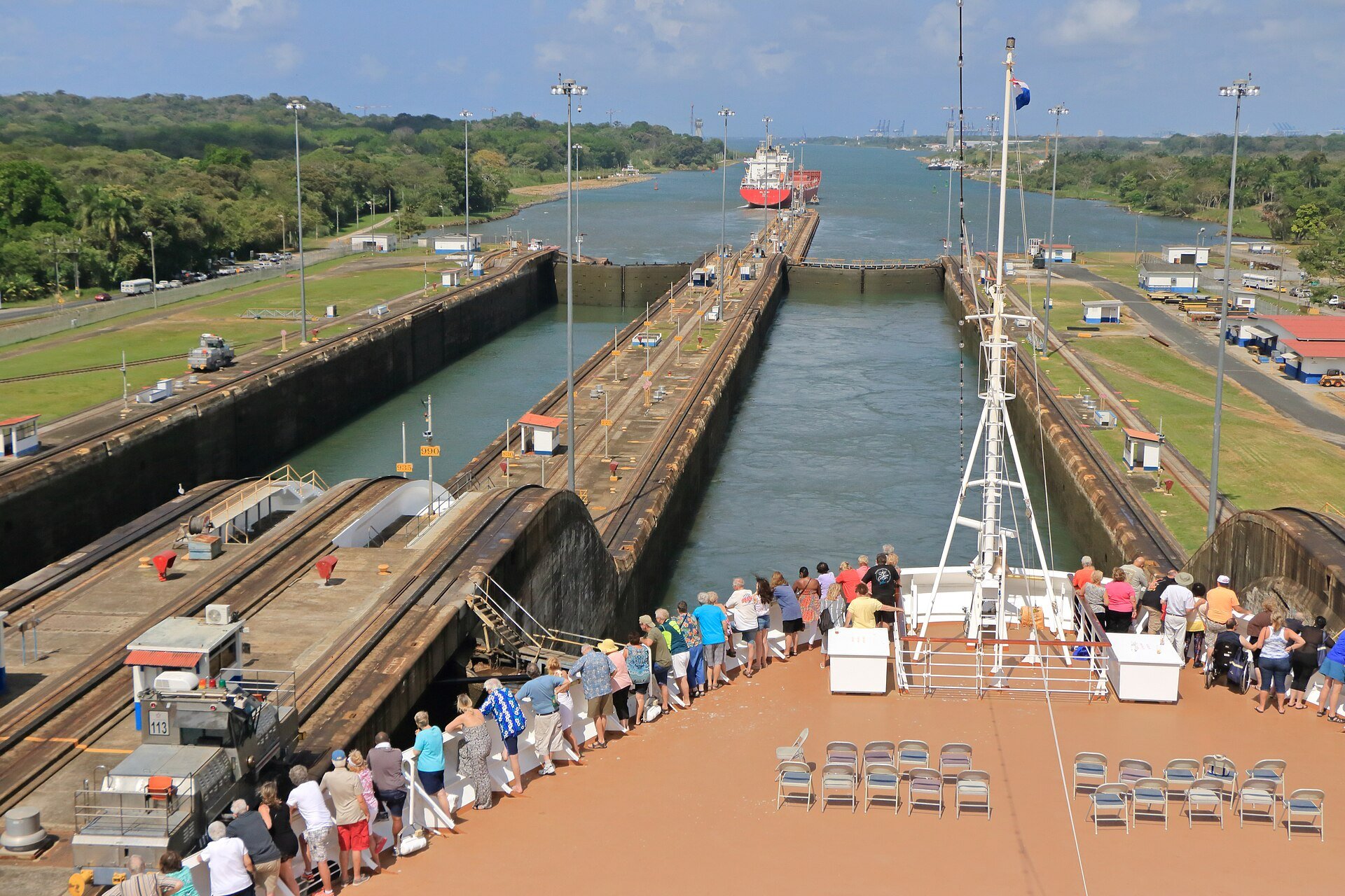 A ship transiting the Panama Canal locks, where traffic and cargo tonnage have risen as draft depth recovered from drought