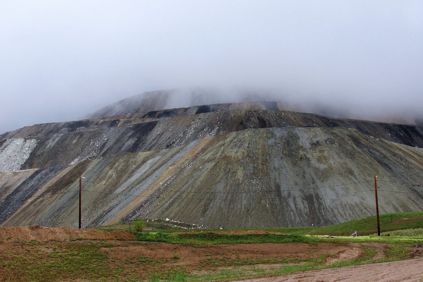 copper tariff - terraced walls of a large open-pit copper mine
