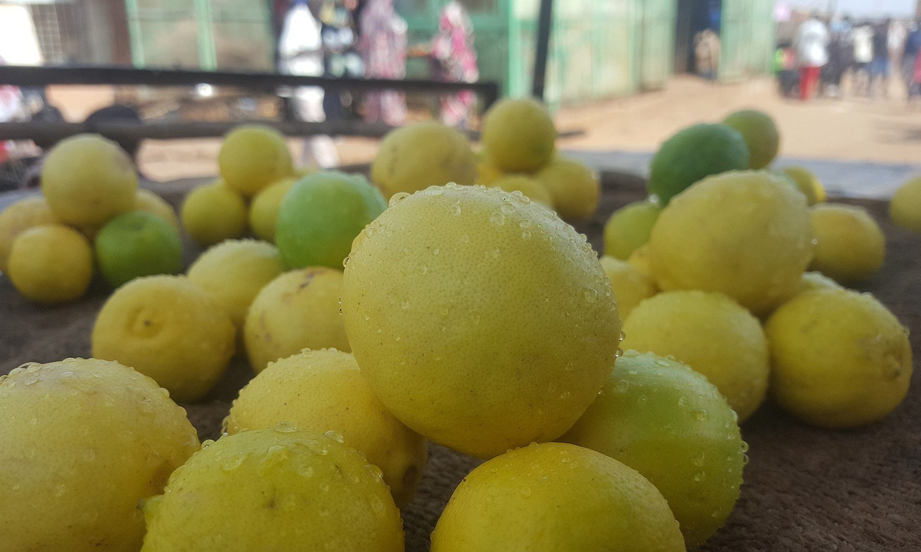 Argentine lemons - a pile of fresh yellow lemons for sale at an open-air market