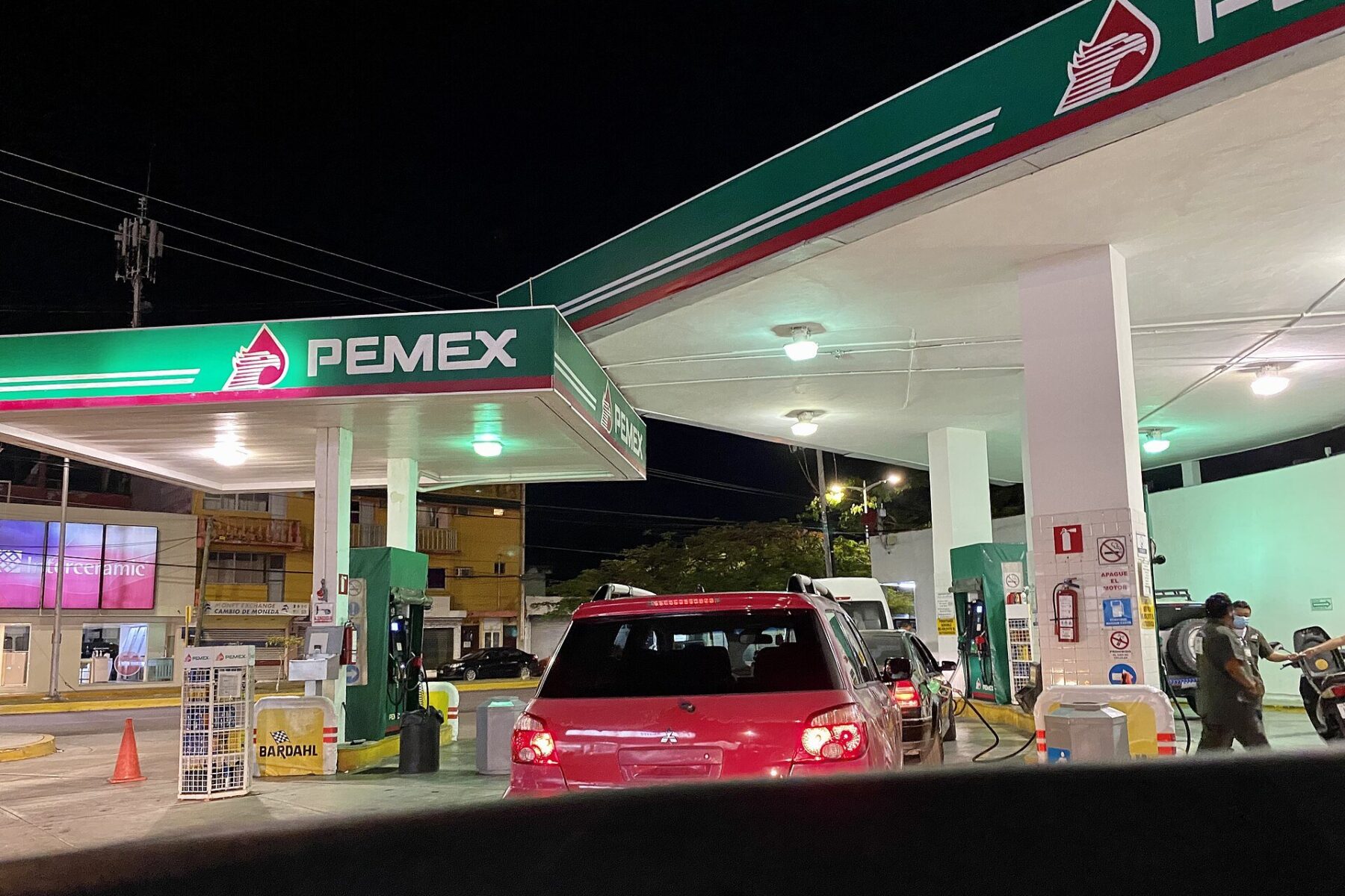 Mexico gasoline price - a Pemex filling station at night