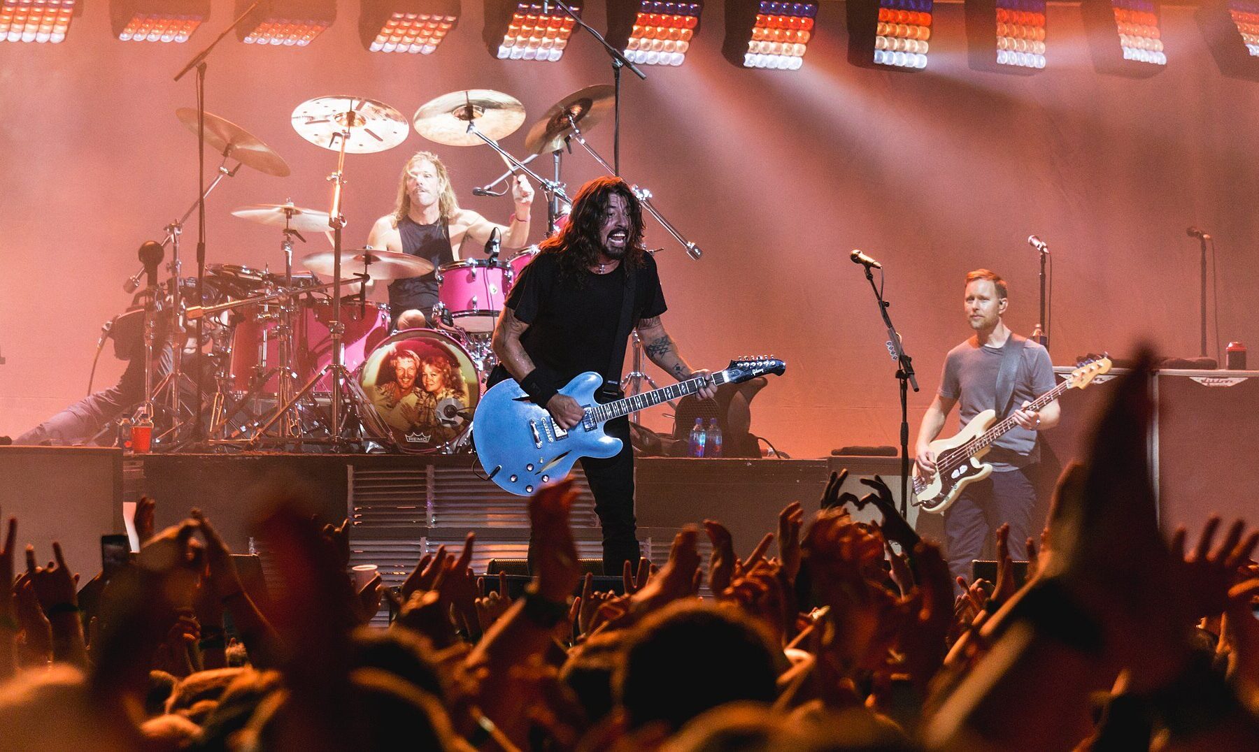 Foo Fighters - the band performing live on stage under bright lights