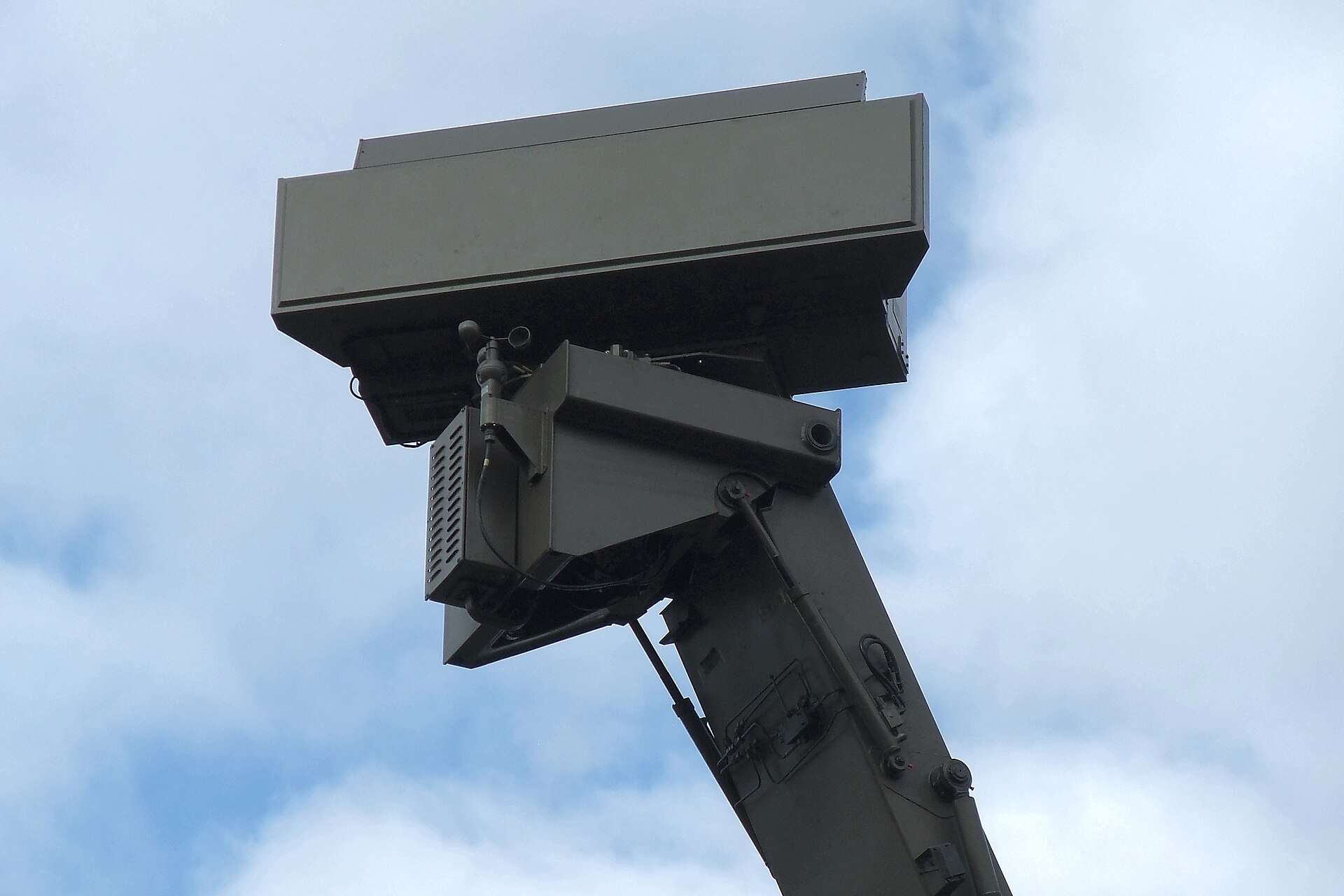 A military radar antenna against the sky, illustrating the kind of phased-array air-defense sensor represented by Brazil's Saber M200 radar.
