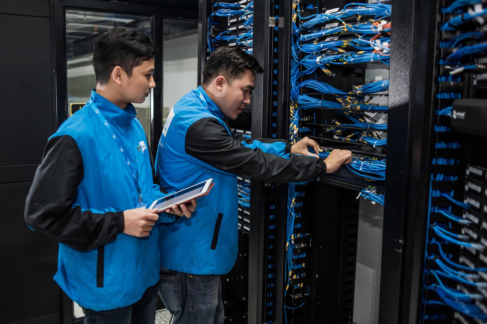 AI data centre — rows of servers in a data centre