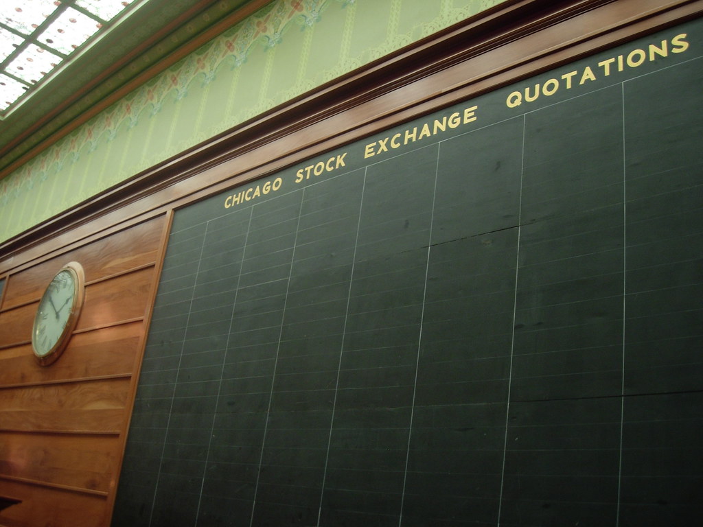A historic stock exchange quotation board, a nod to markets before the open.