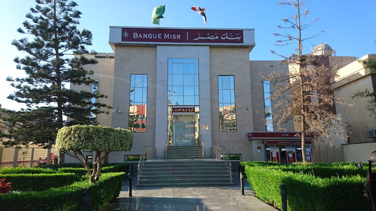 A Banque Misr branch building in Egypt with the bank’s red signage