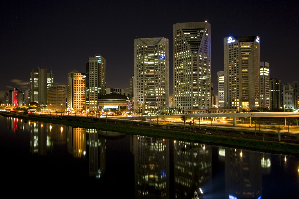 Sao Paulo corporate towers reflected in the Pinheiros river at night