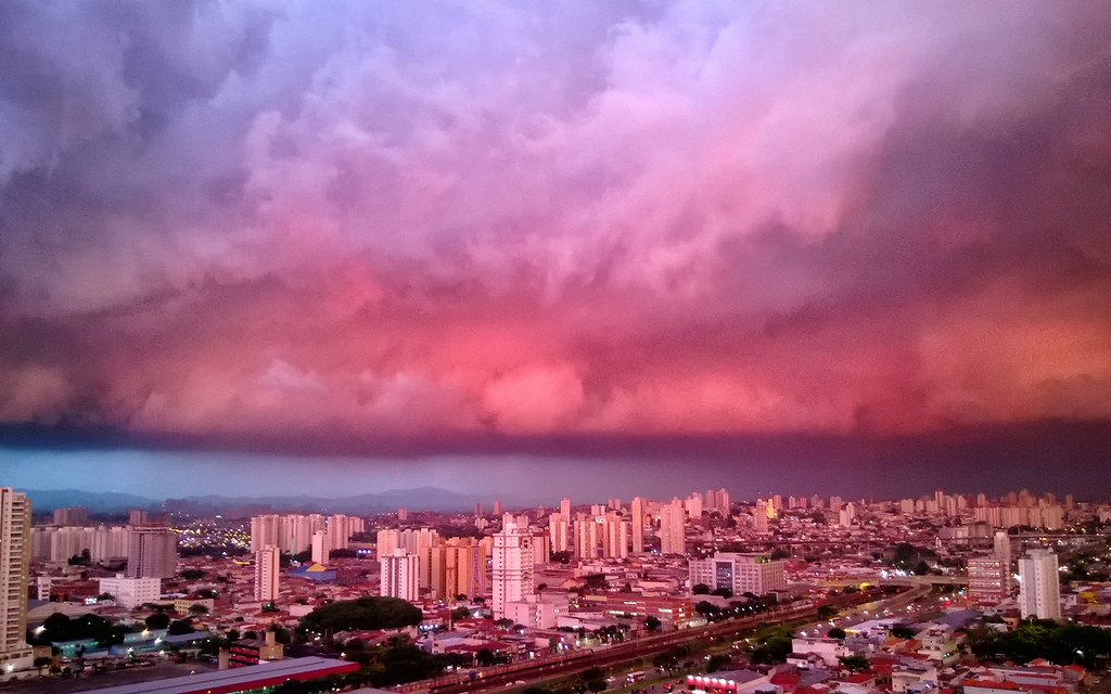 Sao Paulo skyline at dawn under a red sky