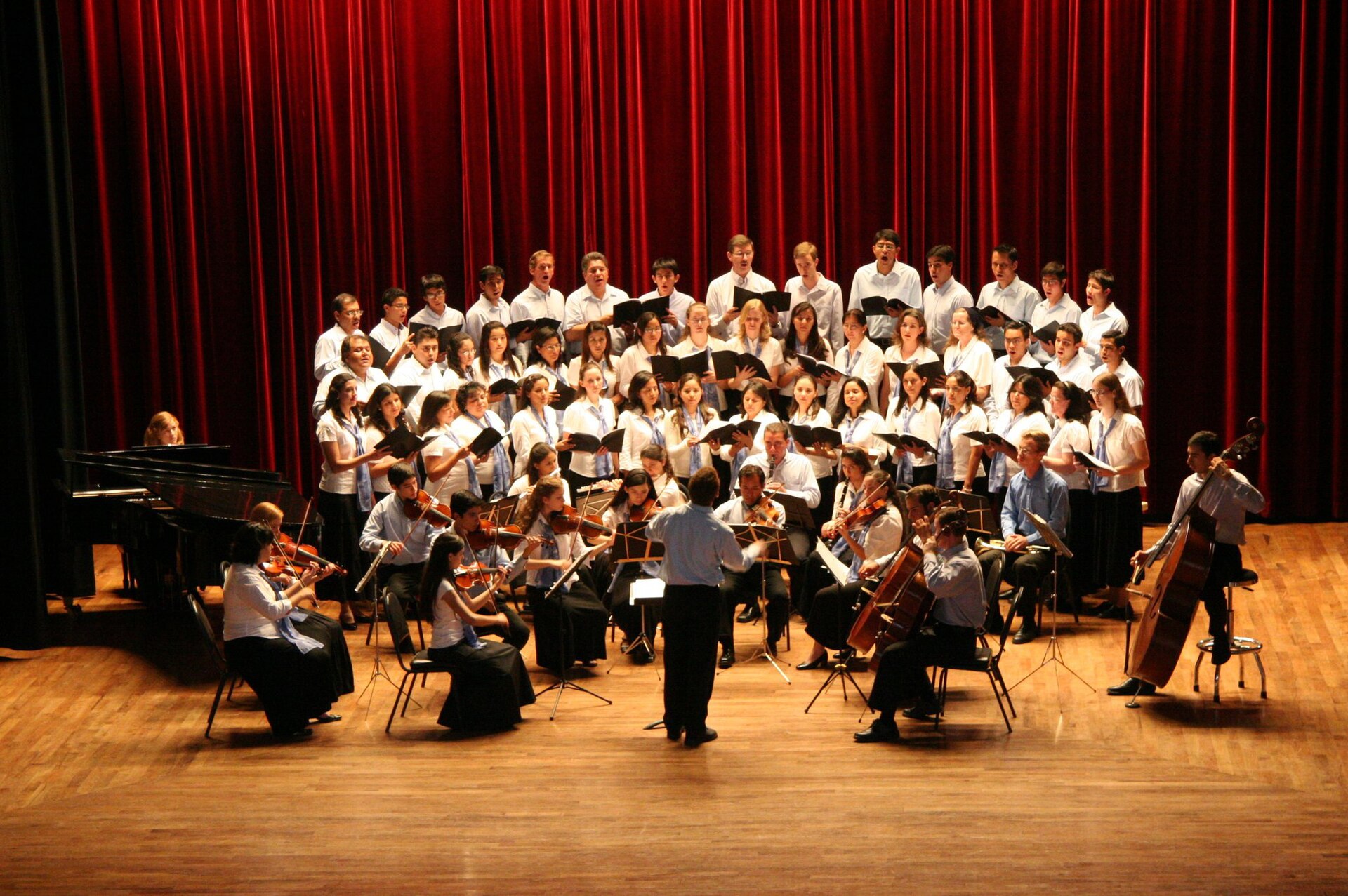 Soda Sinfónico Arequipa: orchestra and choir performing on stage at Teatro Municipal