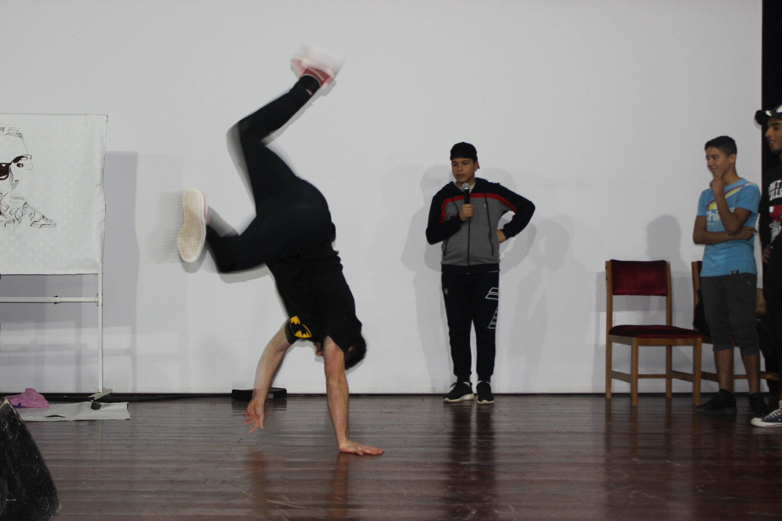 Dakar 2026 Youth Olympic Games — a b-boy performing a powermove