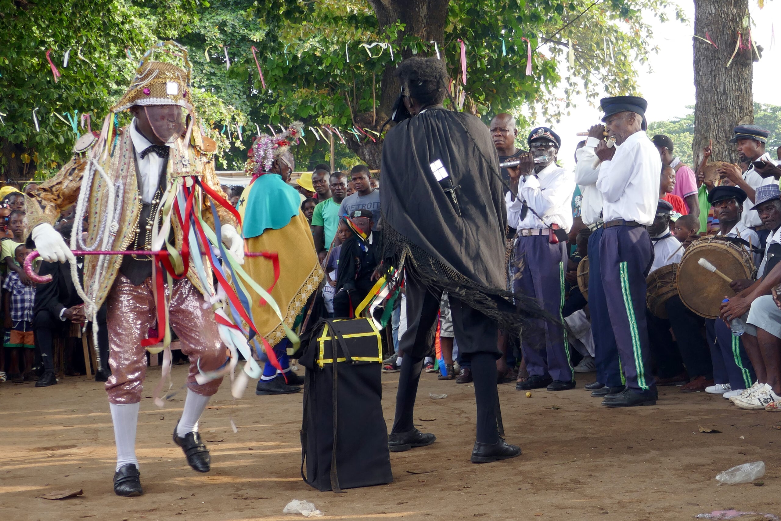 Tchiloli São Tomé — masked performers and musicians at an open-air staging