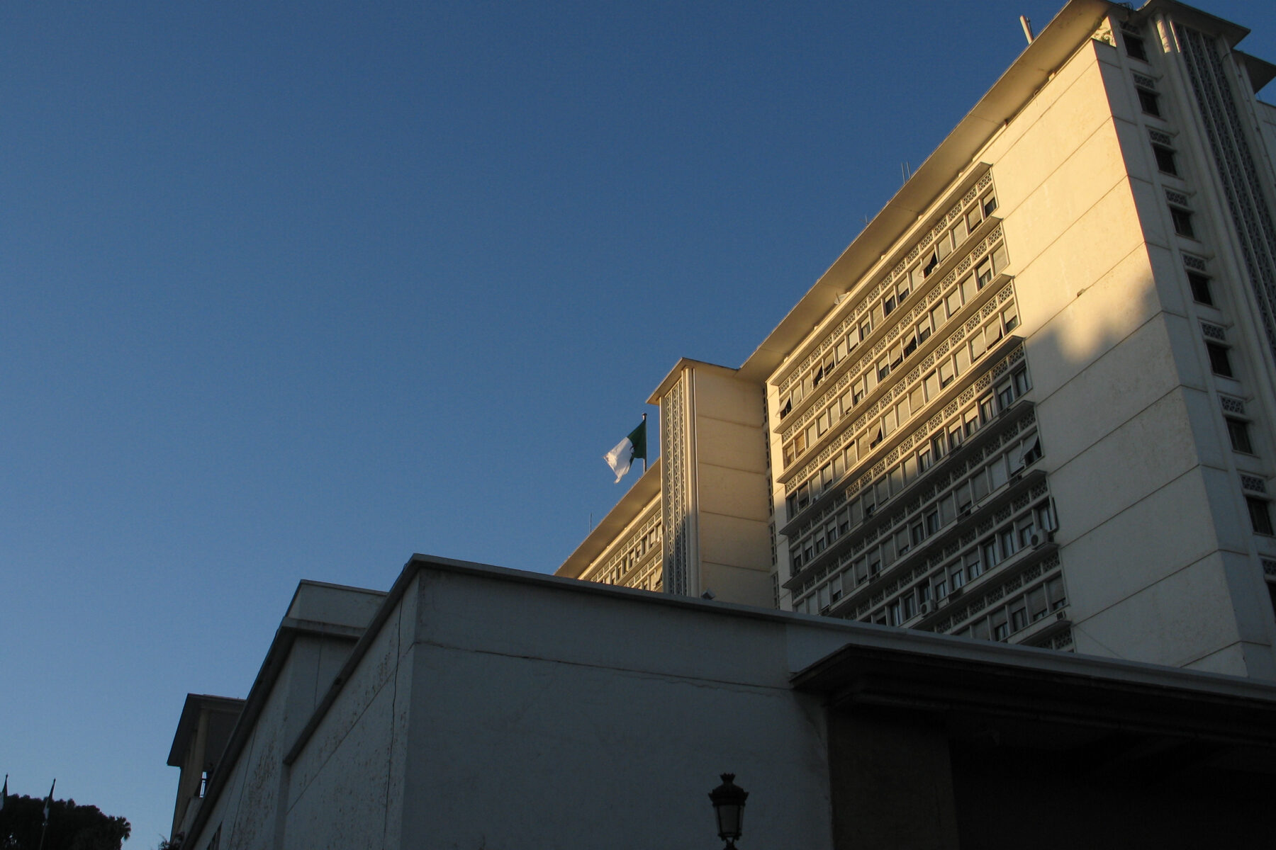 Government Palace in Algiers flying the Algerian flag