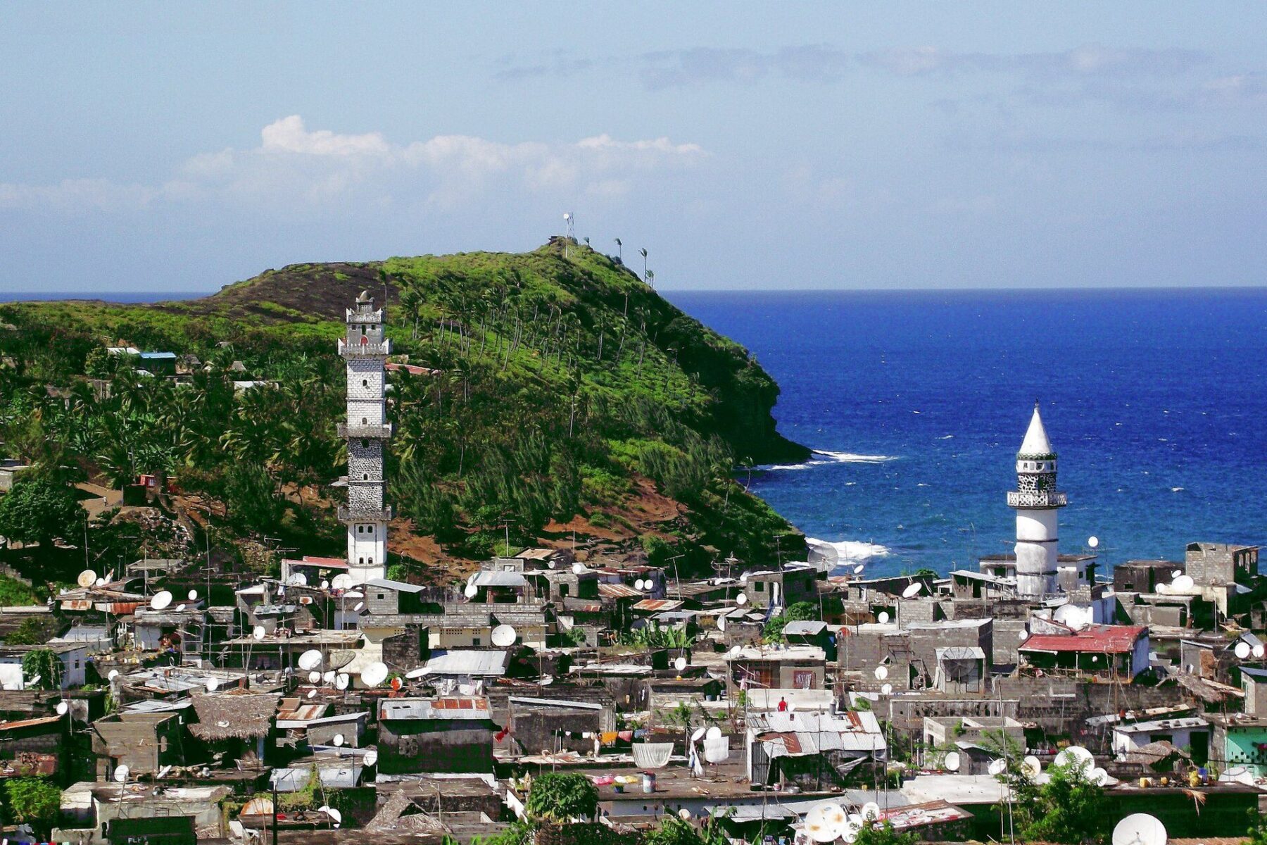 The island of Anjouan in the Comoros, seen from the water, with forested volcanic slopes.