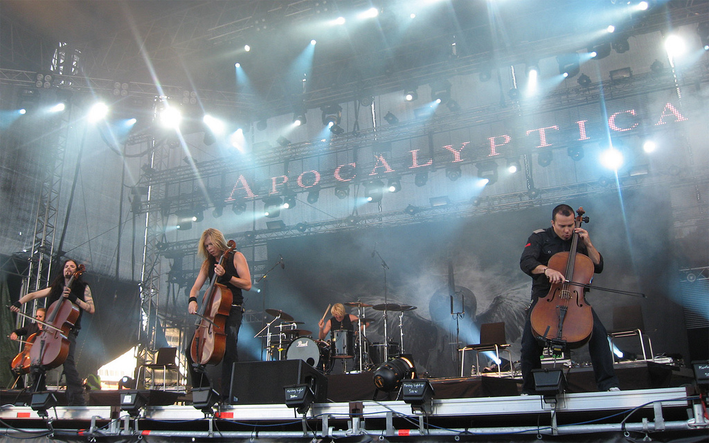 Apocalyptica cellists on a festival stage in Finland, the band behind the Apocalyptica Brazil tour