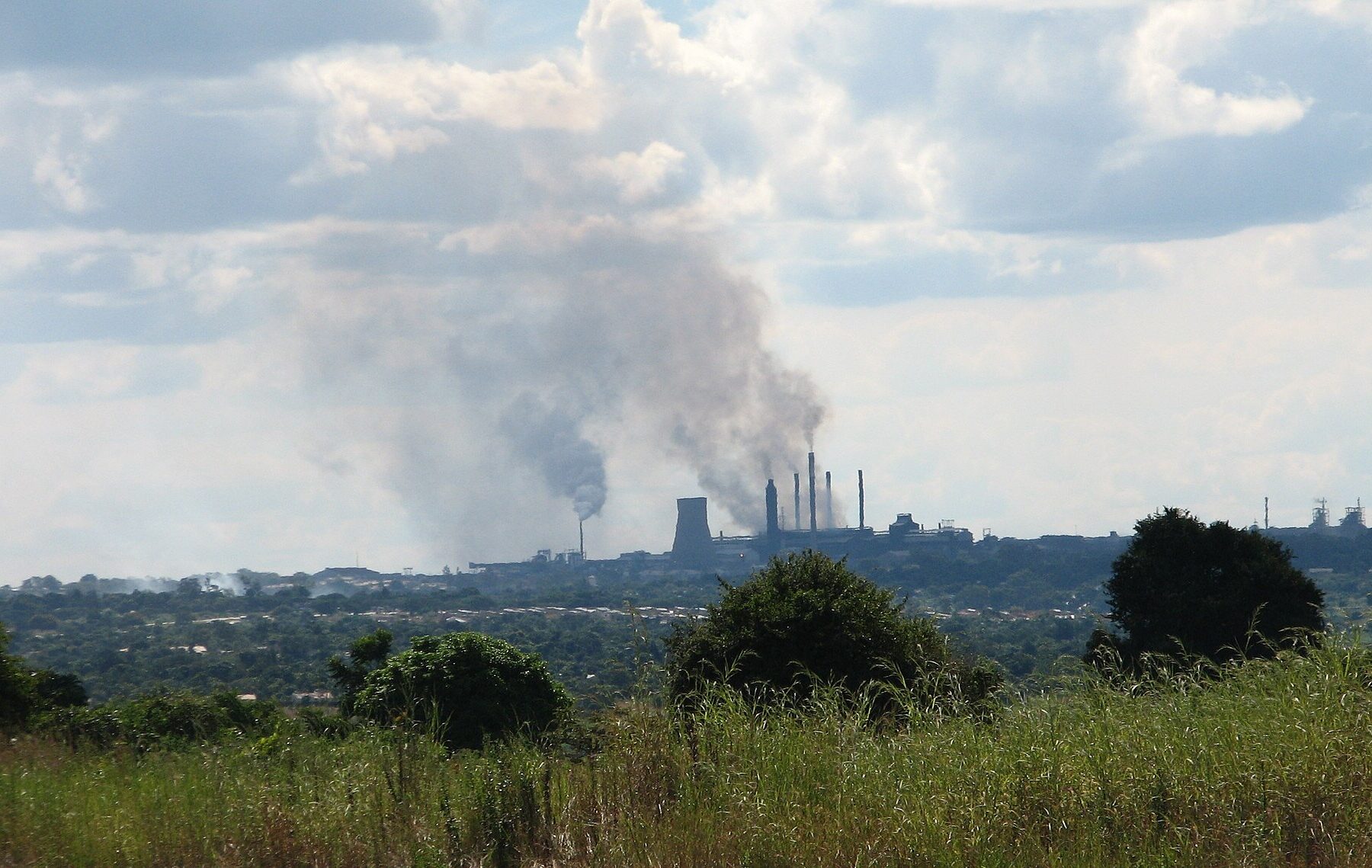 Smelter stacks on the skyline of Kitwe in Zambia's Copperbelt Province
