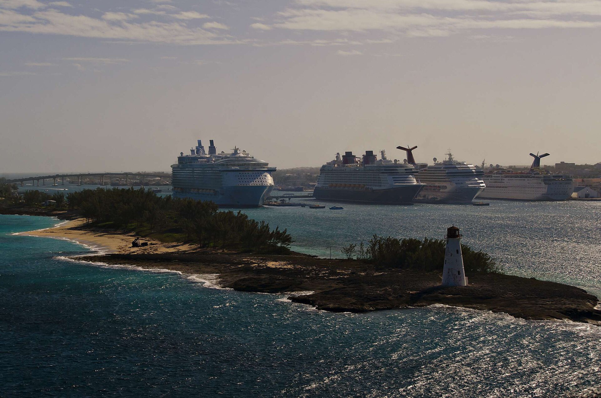 Bahamas explained 2026 — cruise ships in Nassau Harbour behind the Paradise Island lighthouse