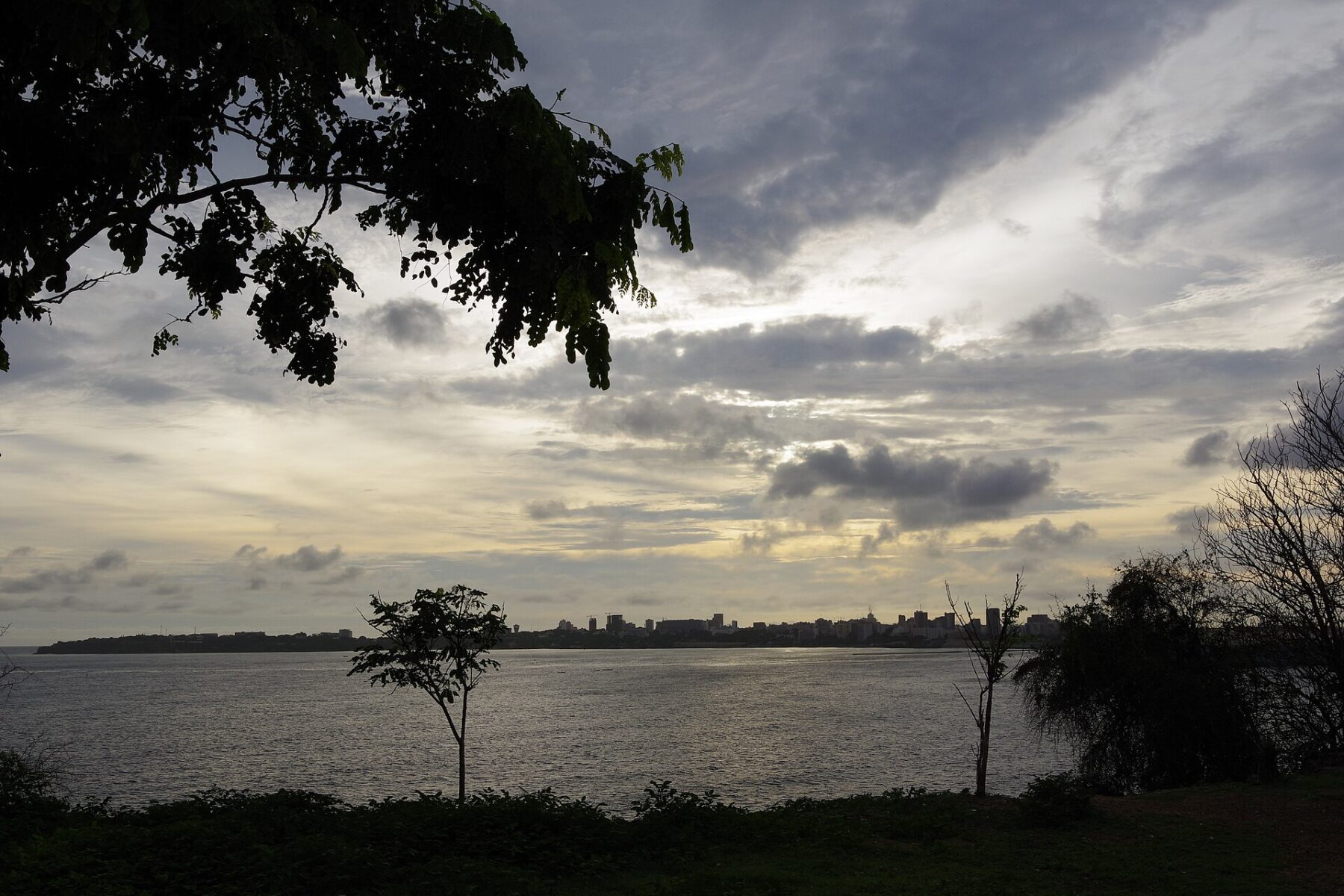 bank account in Senegal 2026 — Dakar skyline seen across the water from Gorée island at dusk
