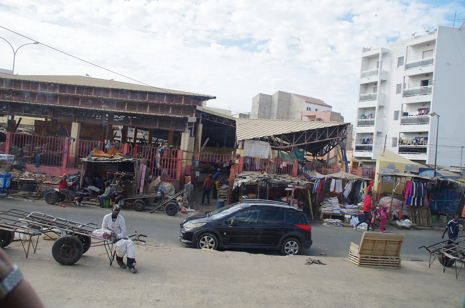 Sandaga market street in Dakar where cash and mobile money like Wave are used daily