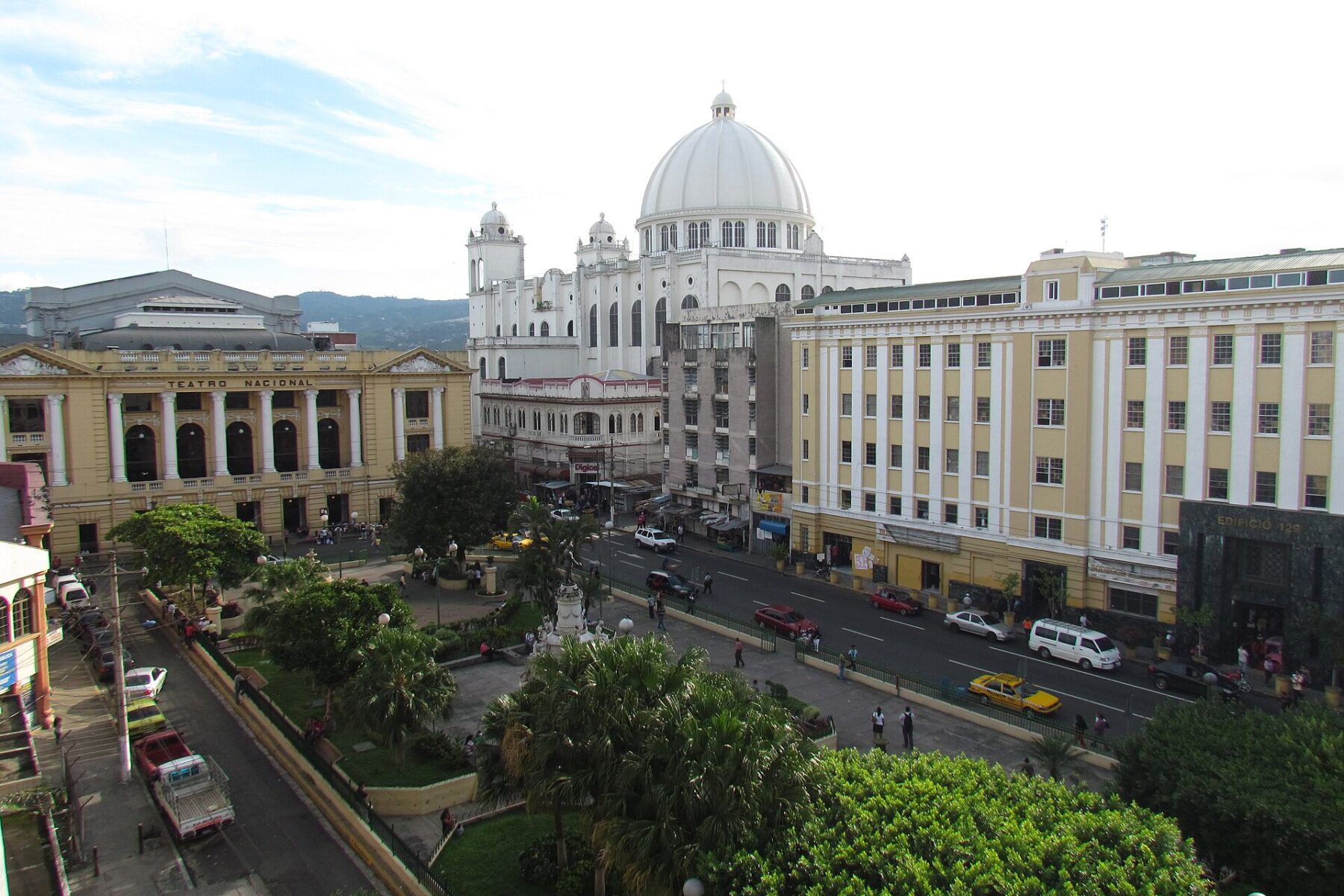 The Centro Histórico of San Salvador seen from above, with the domed cathedral, the Teatro Nacional and a planted square.