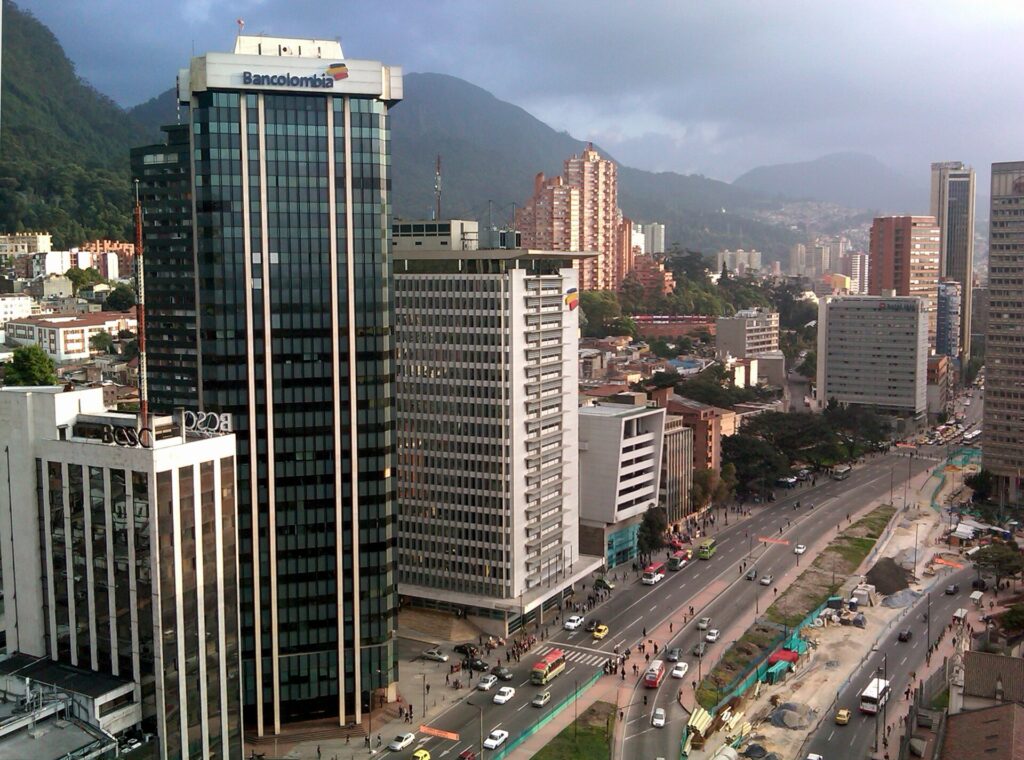 Medellin cityscape with Bancolombia building and mountains
