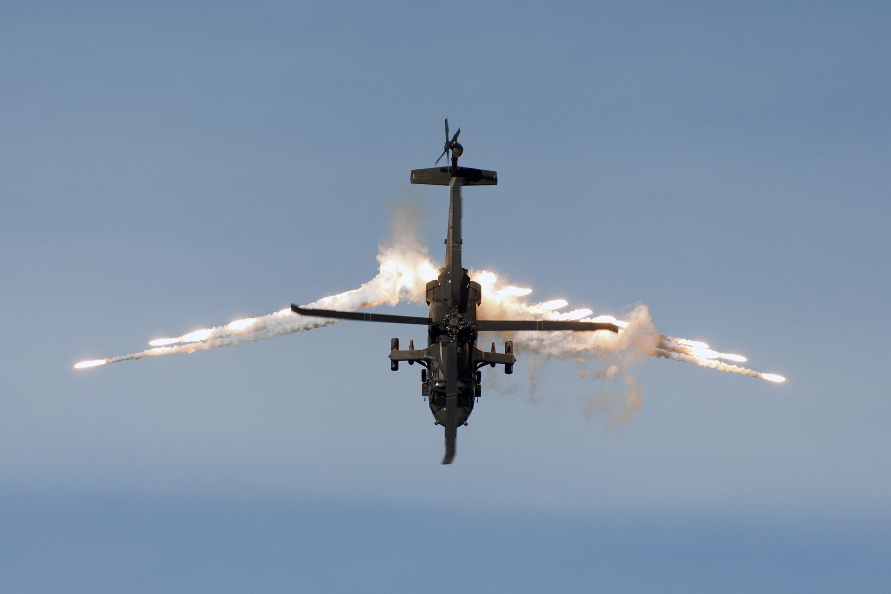 A Colombian Air Force UH-60L Arpia III helicopter releases flares during a demonstration flight