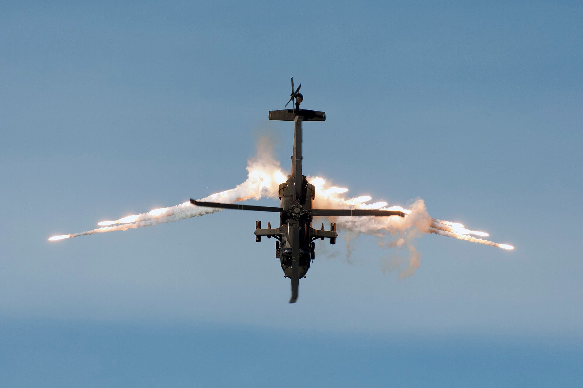 A Colombian Air Force UH-60L Arpia III helicopter releases flares during a demonstration flight