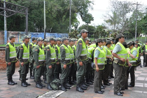 Officers of Colombia’s National Police in formation, the force that arrested the wife and daughter of Ecuador gang boss Fito