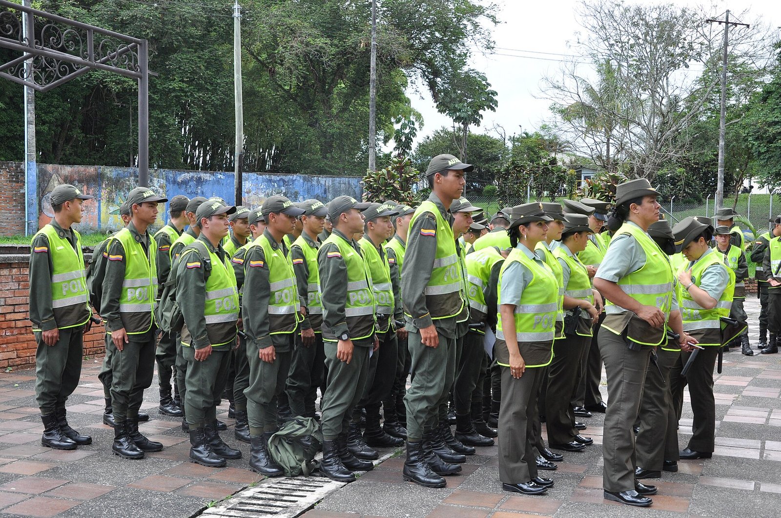 Officers of Colombia’s National Police in formation, the force that arrested the wife and daughter of Ecuador gang boss Fito